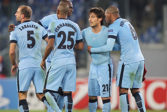 Fernando (right) and Fernandinho (centre) were lauded for their performance for City against Roma