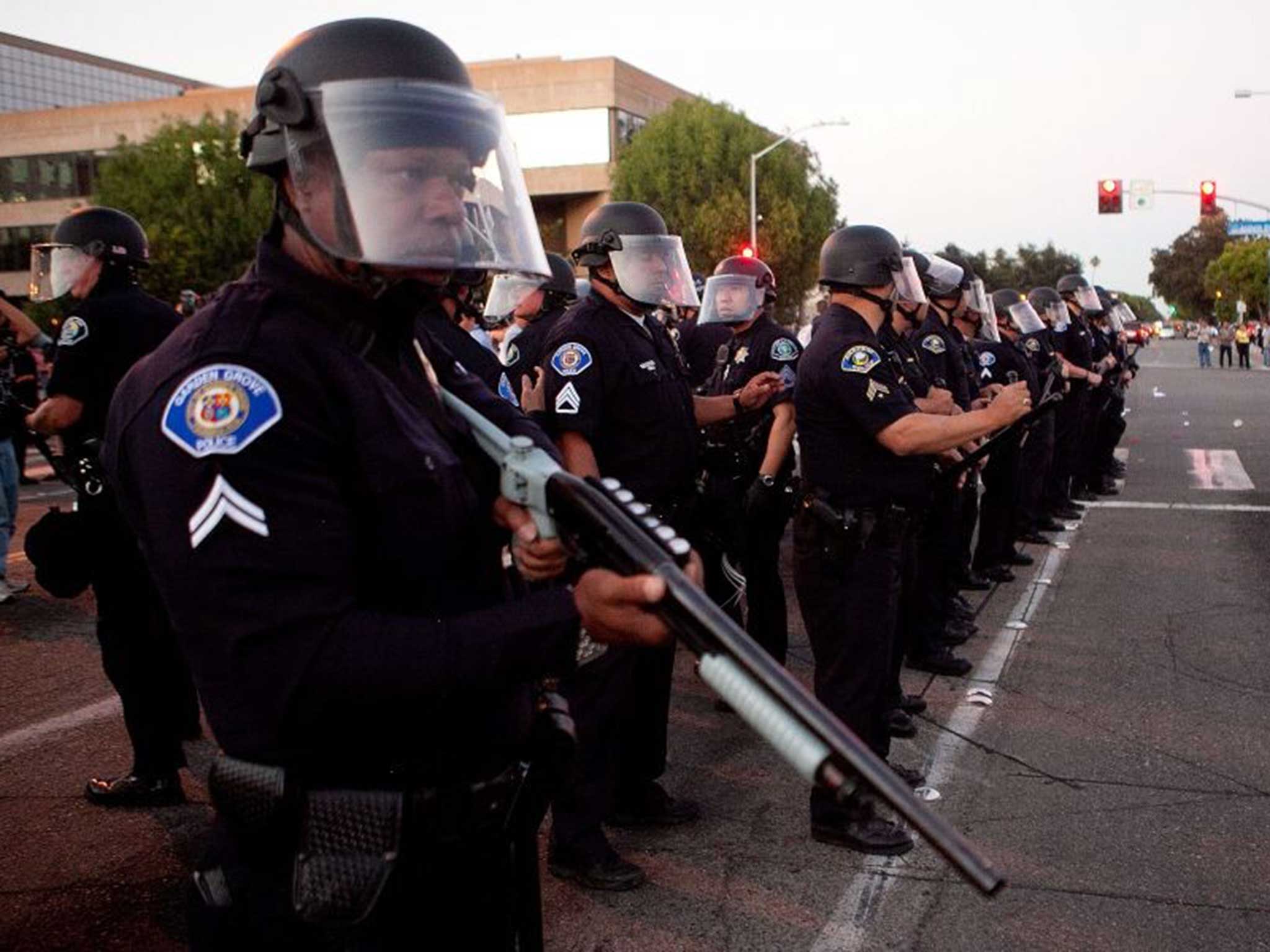 Officers during a protest against the shooting of an unarmed man in Anaheim, California