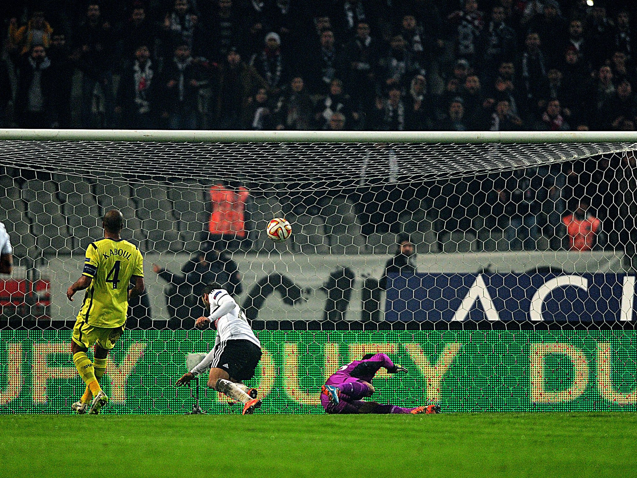 Besiktas forward Cenk Tosun scores the winning goal in the 1-0 victory over Spurs