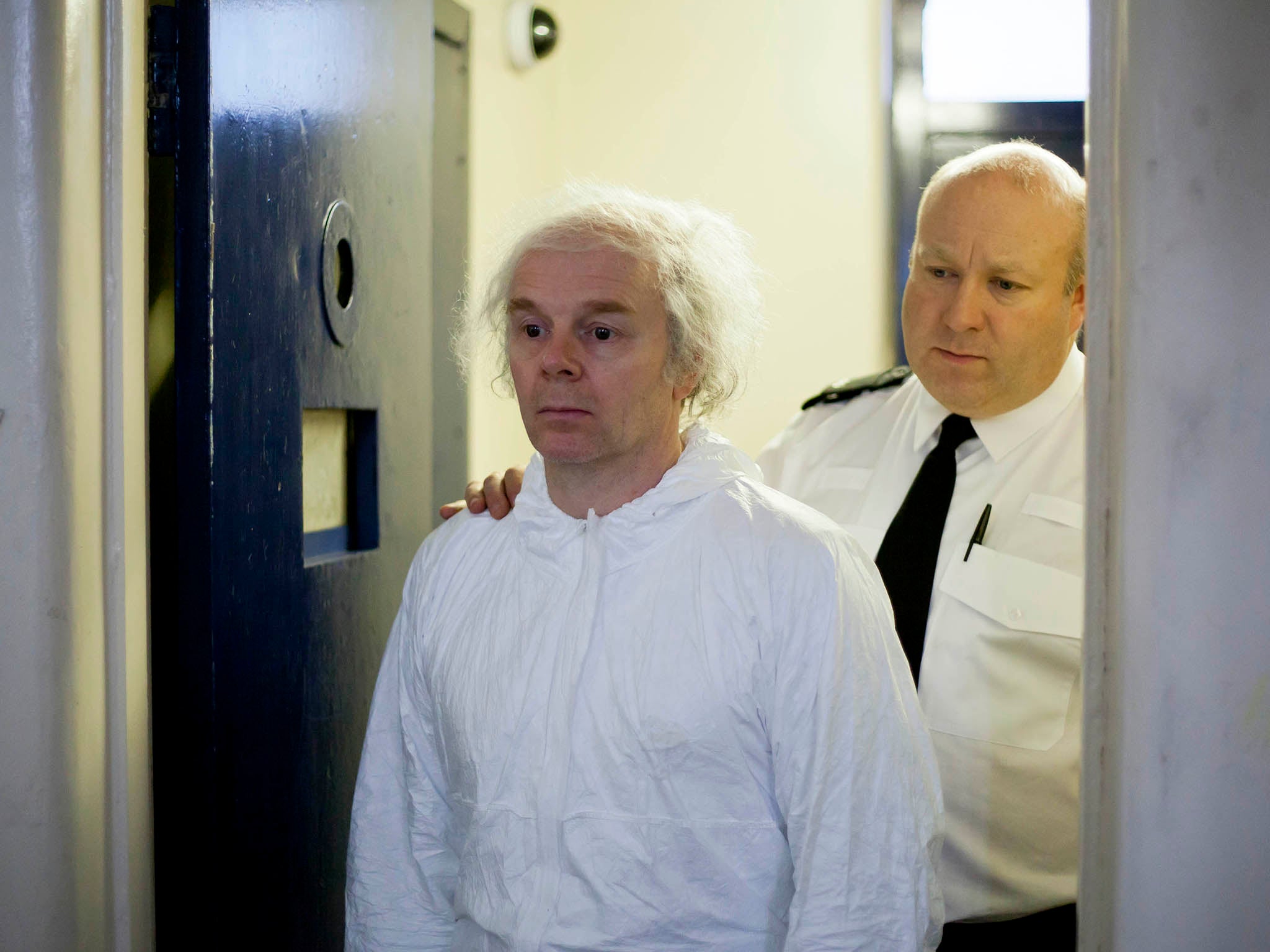 Pictured: Jason Watkins as Christopher Jefferies and Howard Coggins as Custody in The Lost Honour of Christopher Jefferies