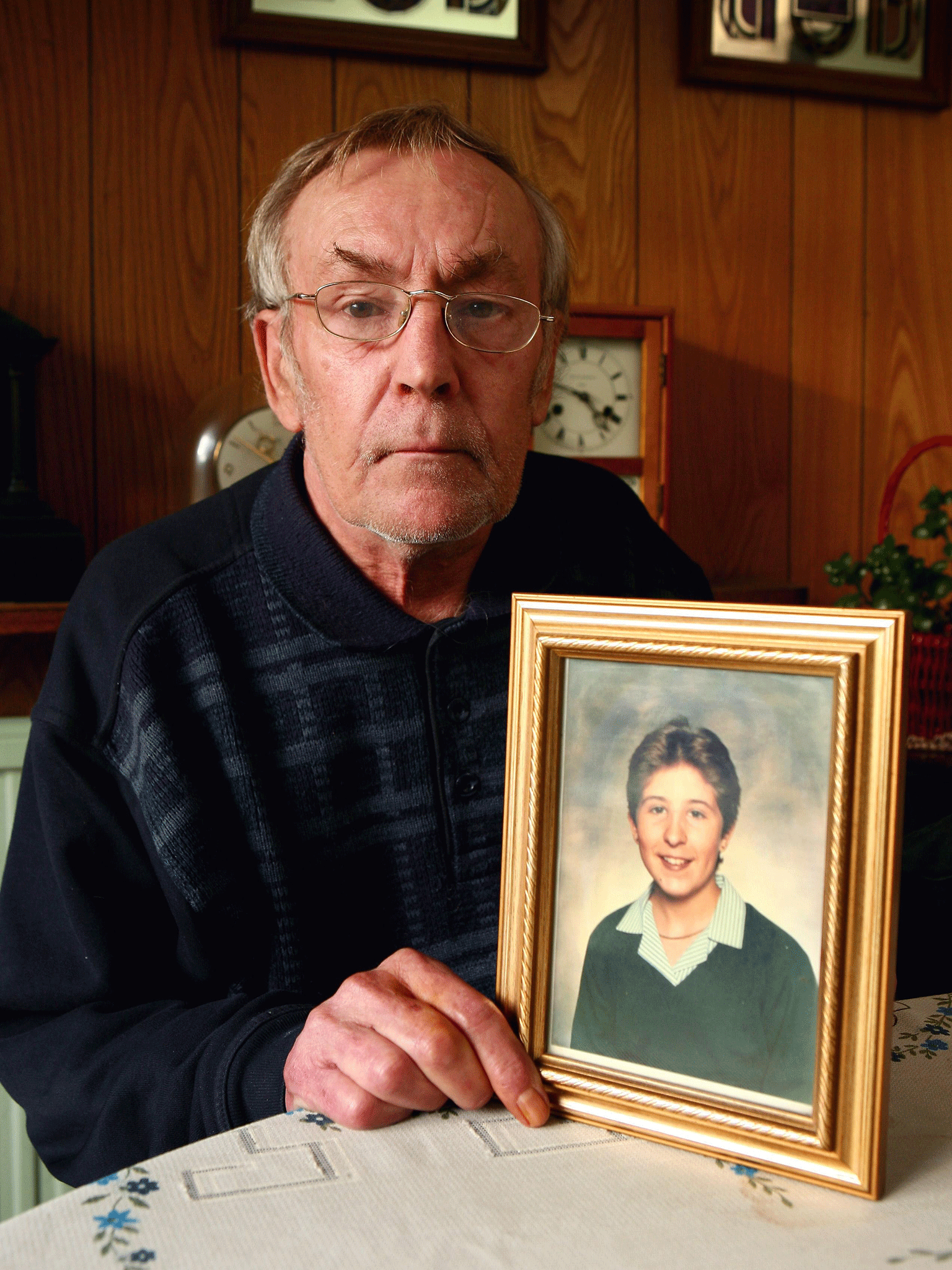 File photo from 2010 of Cliff Tiltman holding a picture of his daughter Claire Tiltman, who was killed on January 18 1993, just four days after her 16th birthday