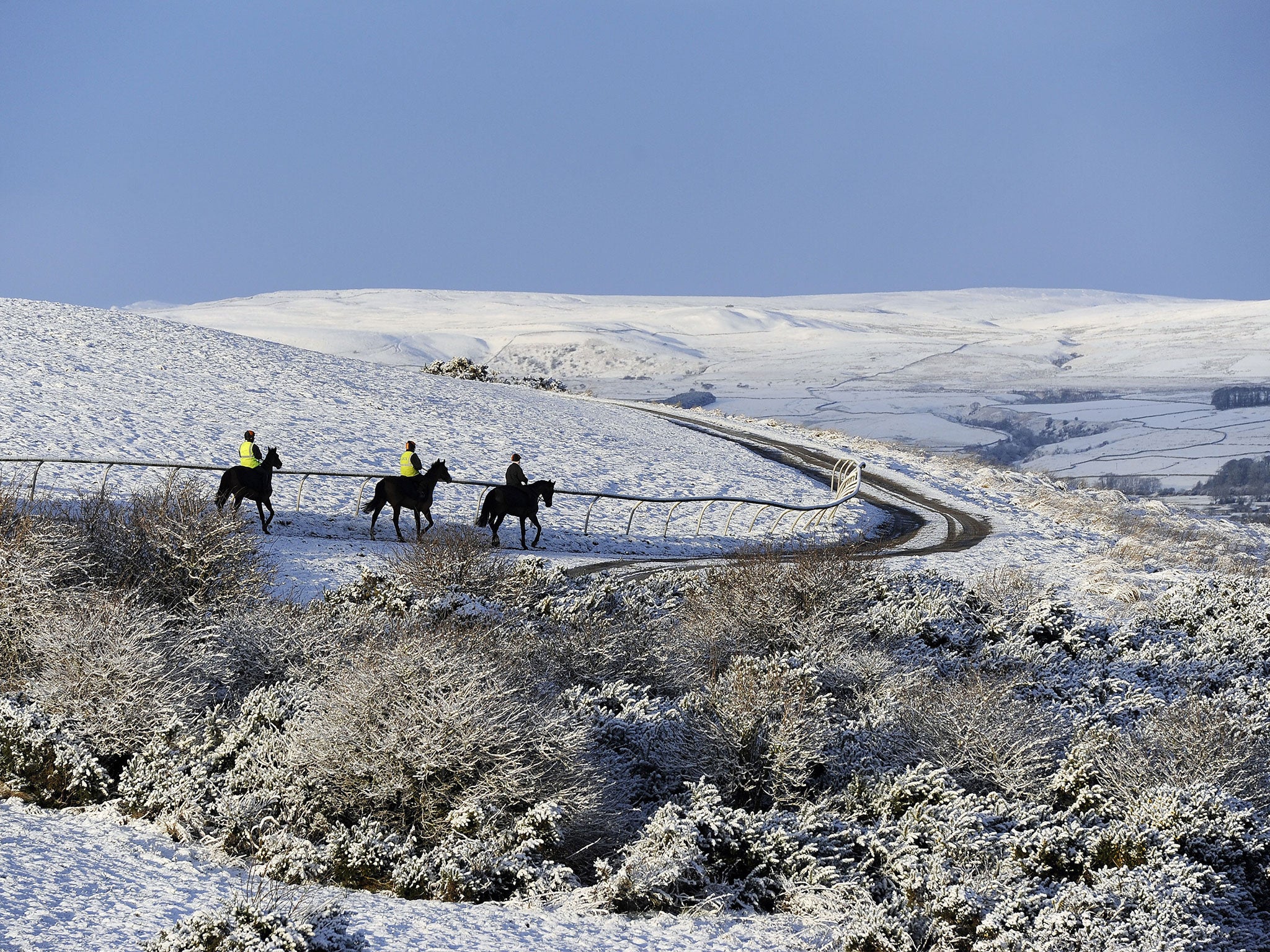 Horse riders travel though overnight snow in the Yorkshire Dales last weekend