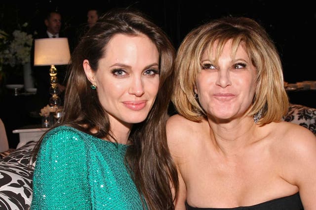 Angelina Jolie and Sony Pictures co-chairman Amy Pascal at the Golden Globes in 2011