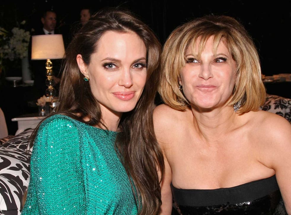 Angelina Jolie and Sony Pictures co-chairman Amy Pascal at the Golden Globes in 2011
