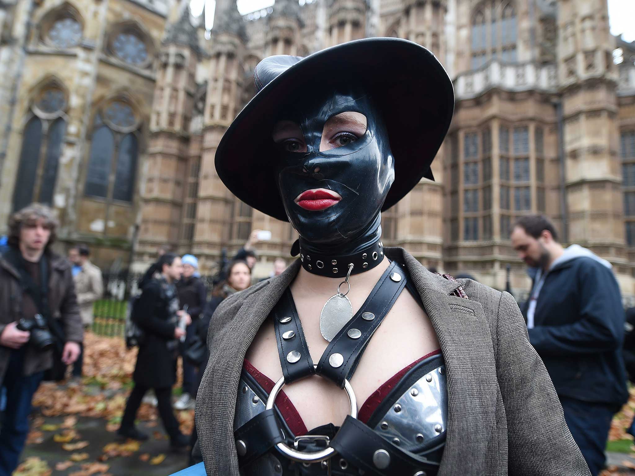 One of the 'face-sitting' protesters outside parliament