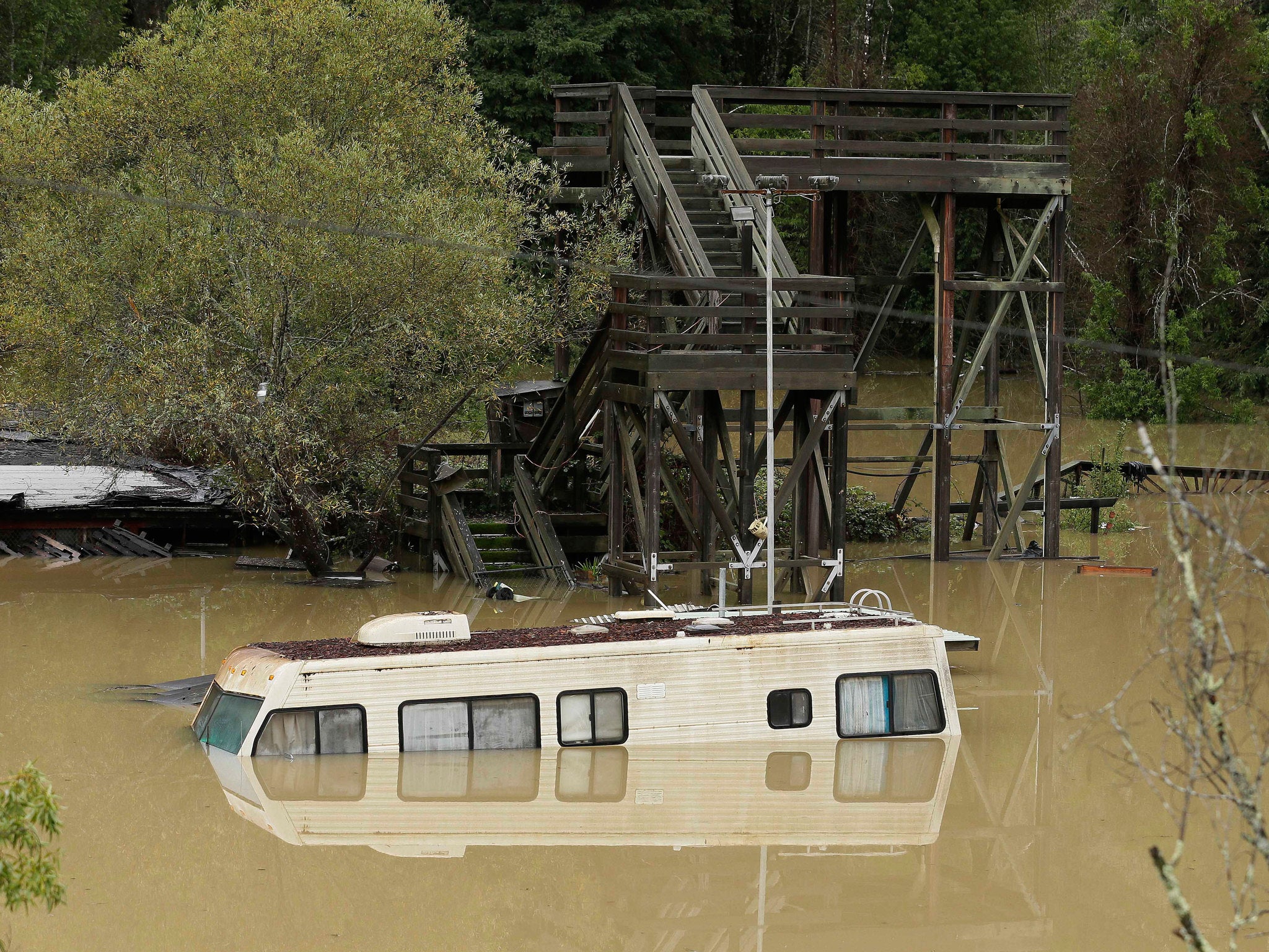 An RV caravan underwater caused by the flooded Russian River