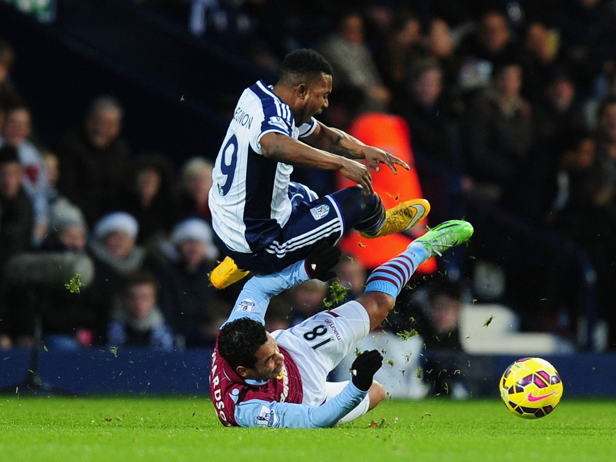 Kieran Richardson scythes down Stephane Sessegnon