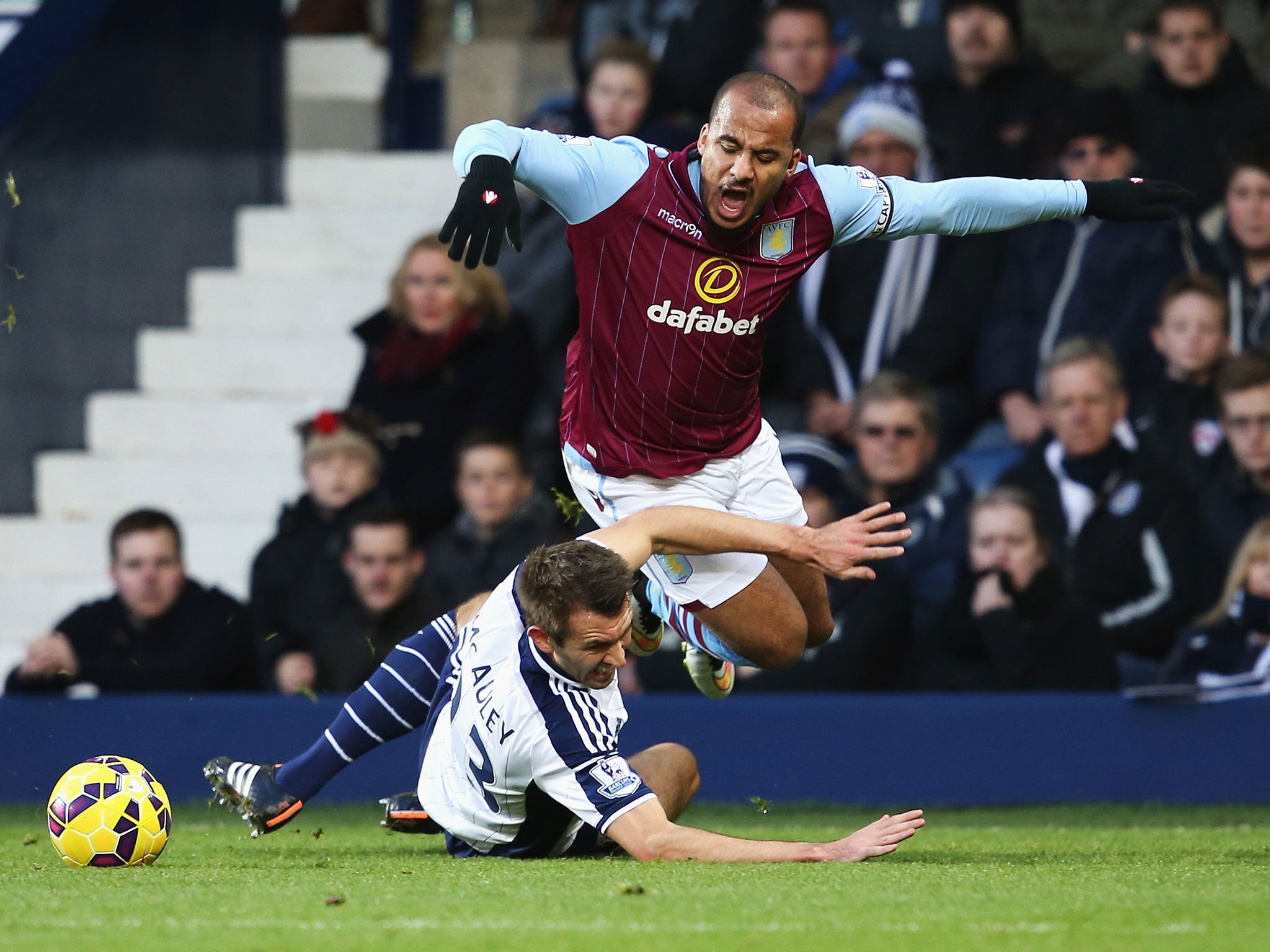 Gareth McAuley tackles Gabriel Agbonlahor