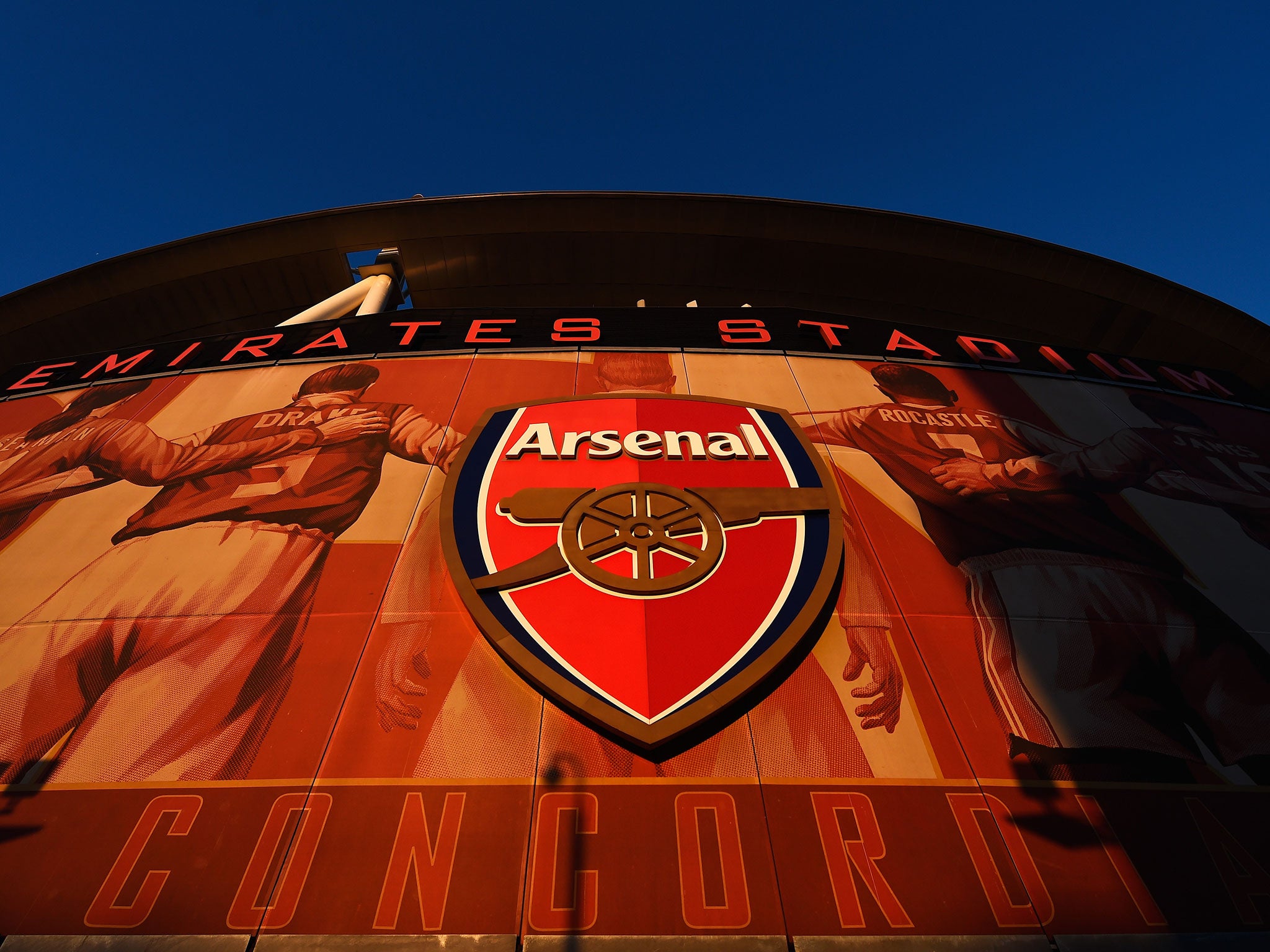 The Emirates Stadium lit up in the evening ahead of Arsenal v Newcastle