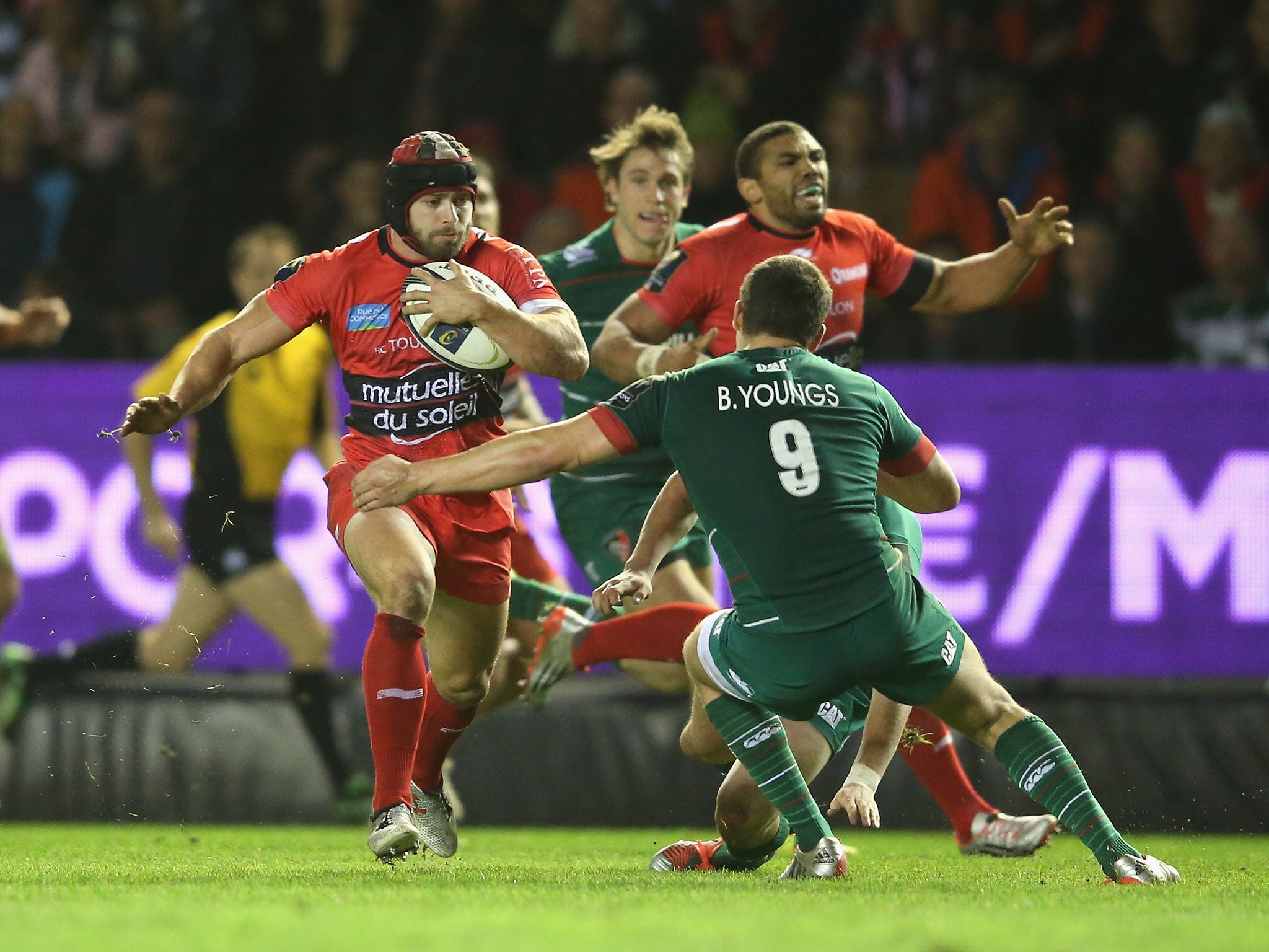 Leigh Halfpenny tries to sidestep Ben Youngs