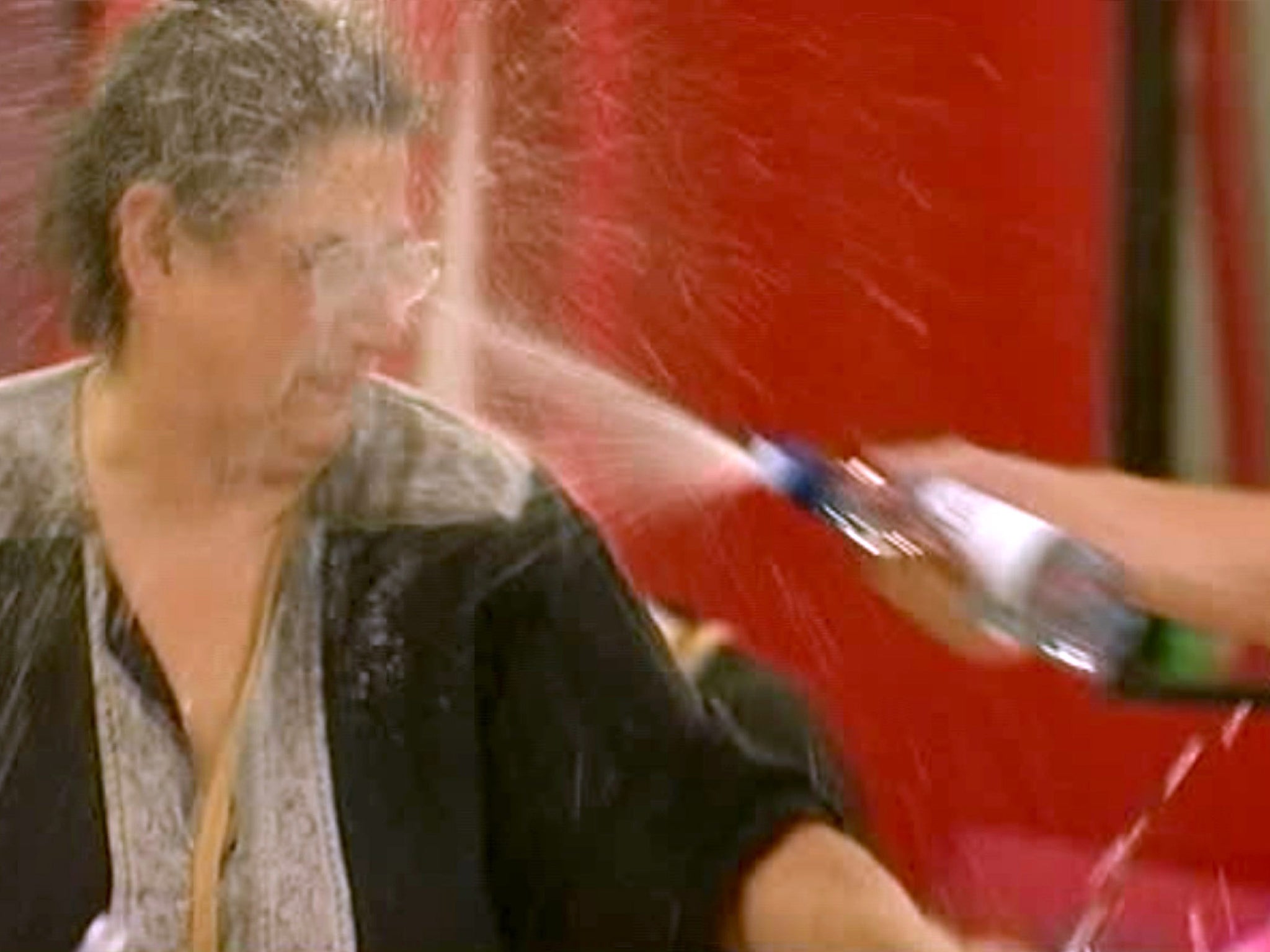 Ziggy squirts water in Carol's face during a water fight in Big Brother 8 in 2007