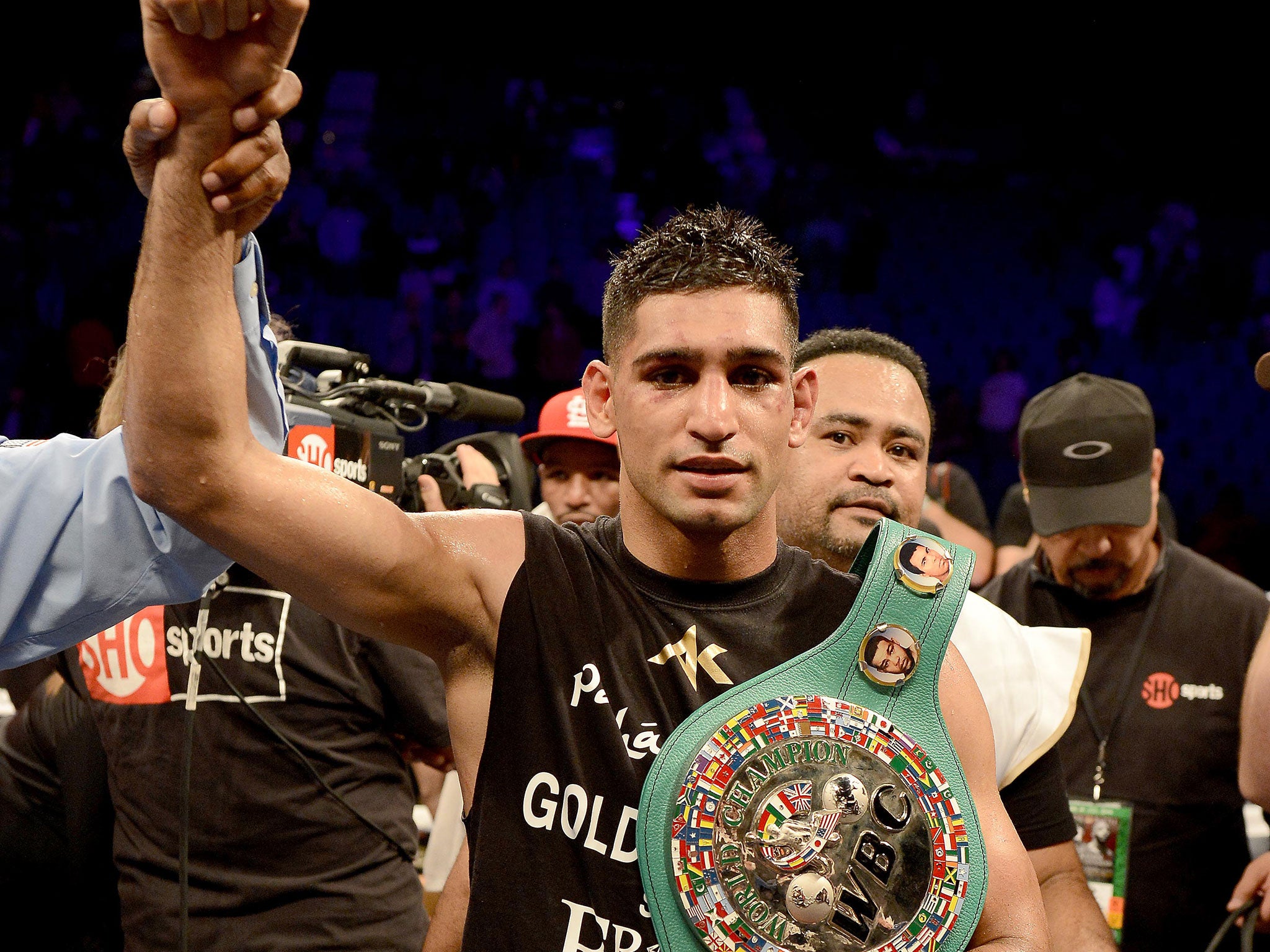 Amir Khan celebrates his win over Devon Alexander for the lightly-regarded WBC 'silver' belt