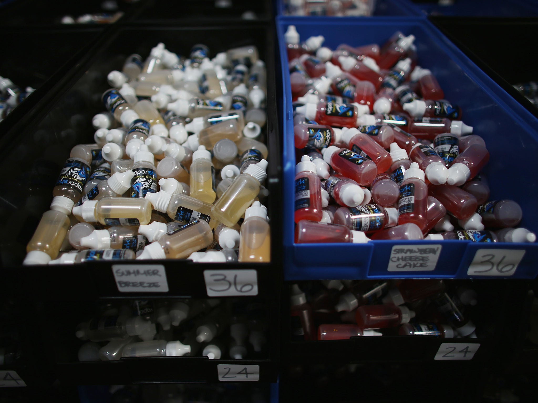 Flavoured e-cigarette liquid nicotine is seen for sale at the Vapor Shark store on 6 September, 2013 in Miami, Florida