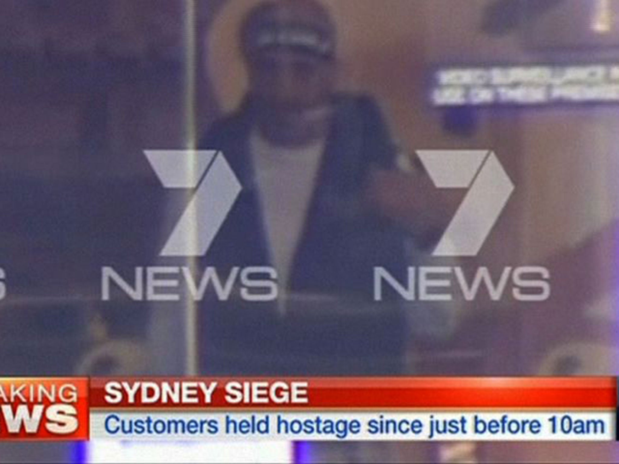 This video image shows the suspected hostage-taker inside the cafe