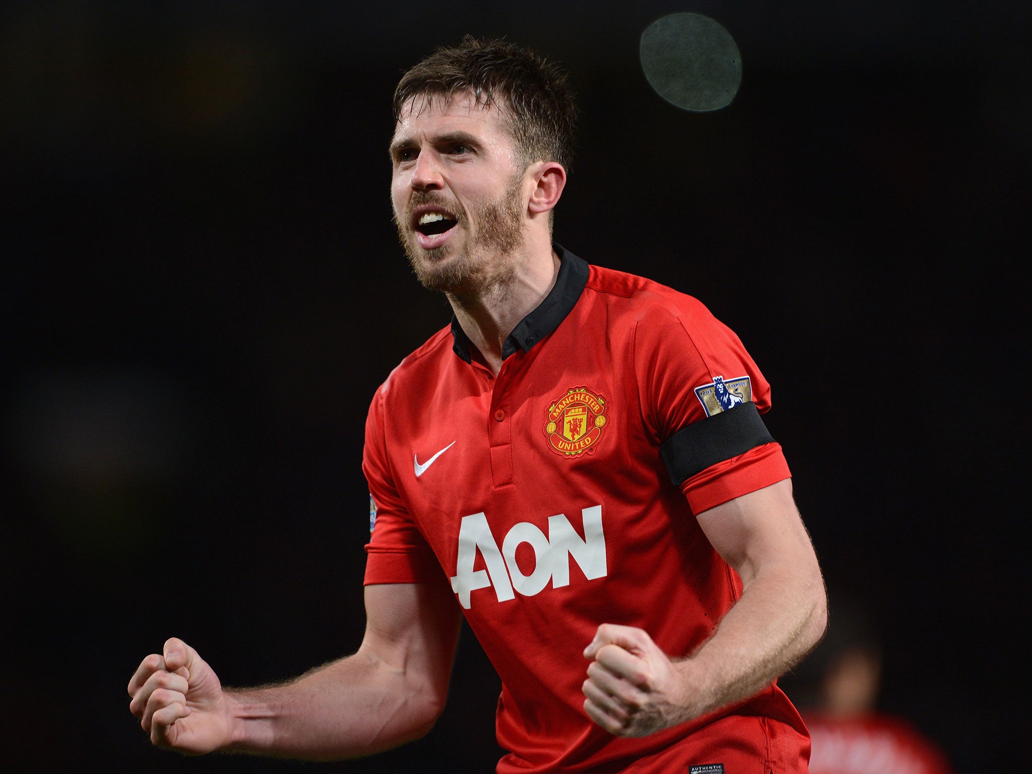 Michael Carrick celebrates Manchester United's win over Liverpool