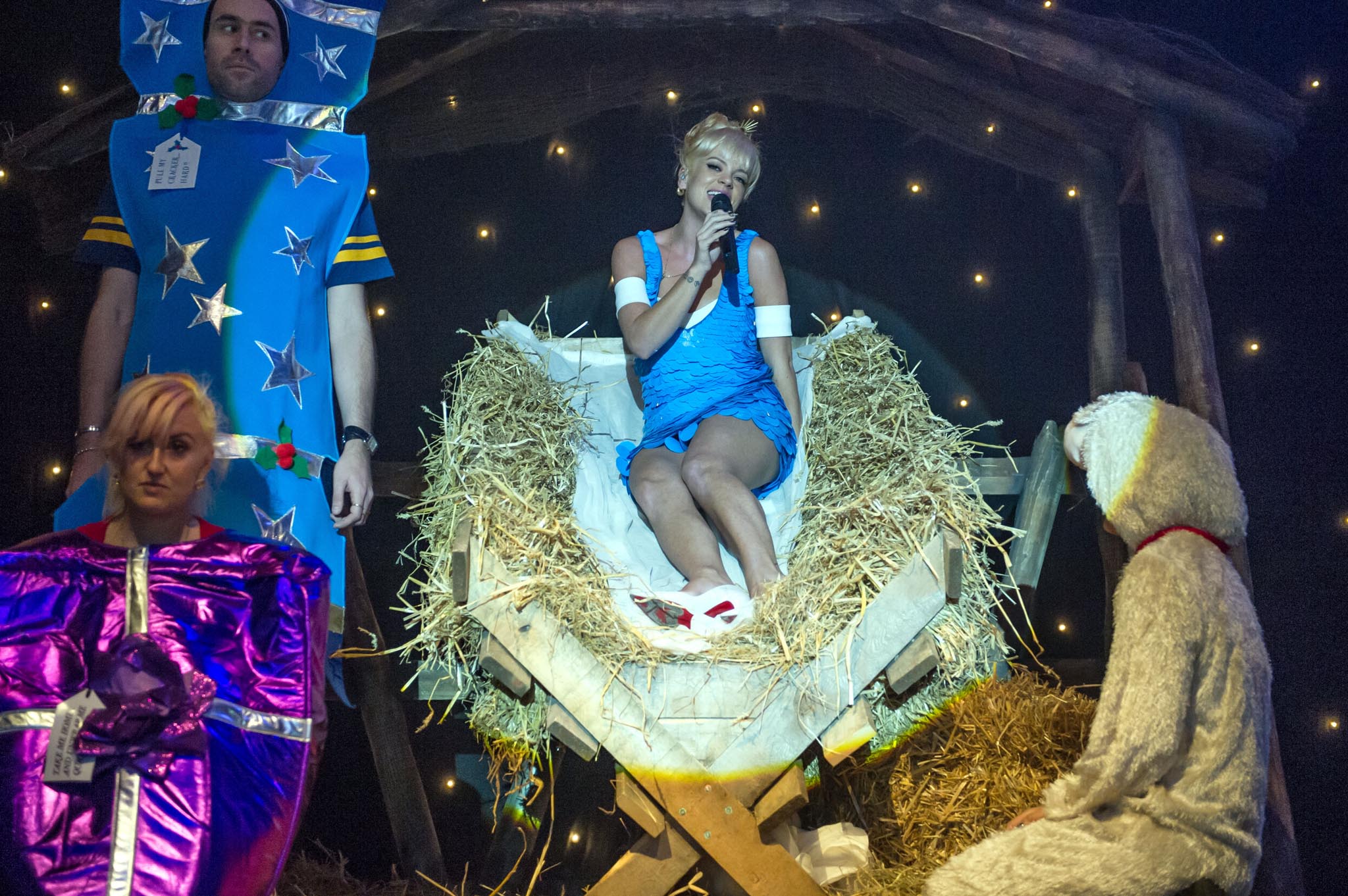 Lily Allen performs a 'sexy nativity scene' on stage at Brixton Academy 