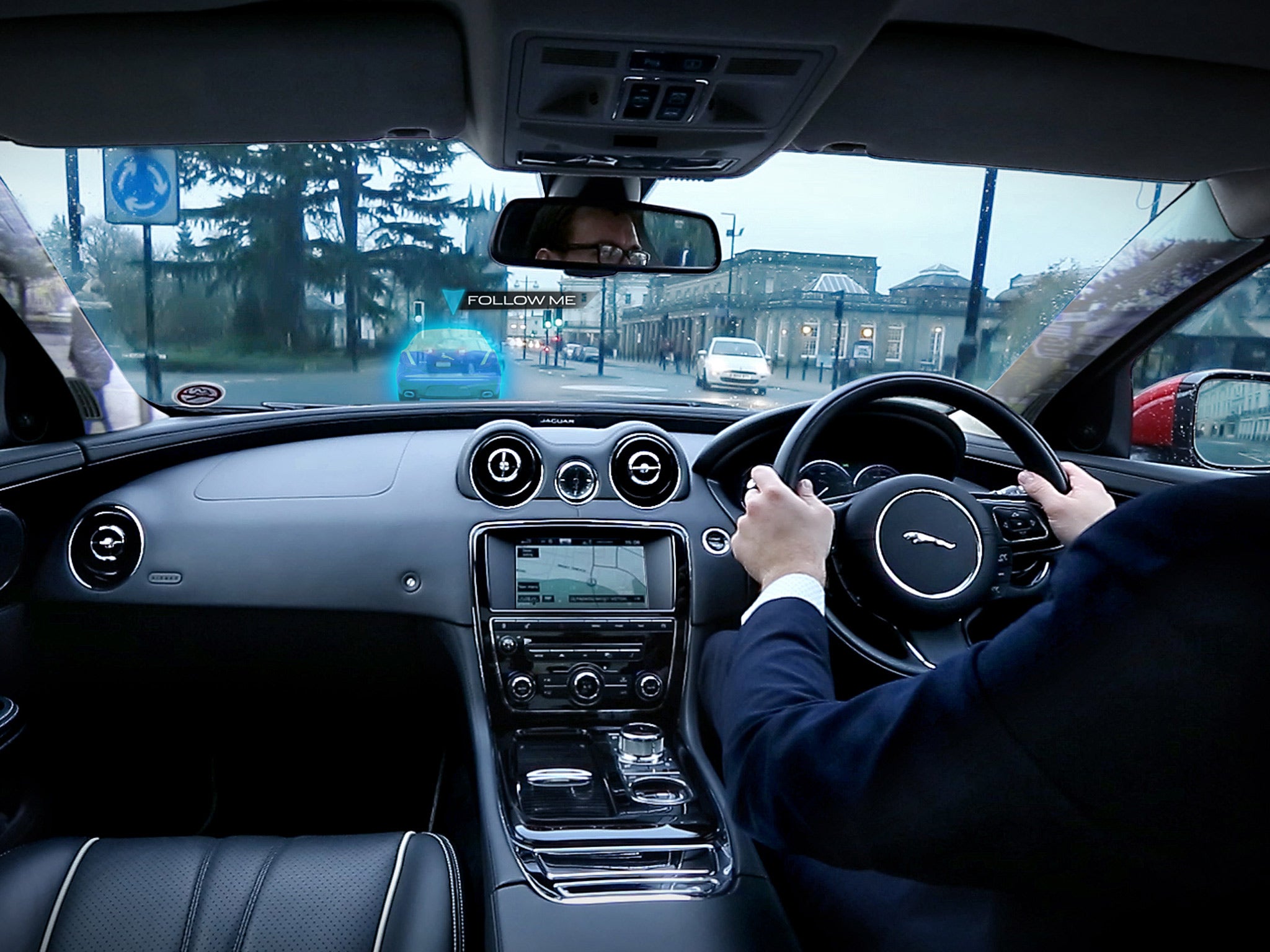 The windscreen projects a virtual car to follow, which Jaguar says is more natural and safe than normal sat navs