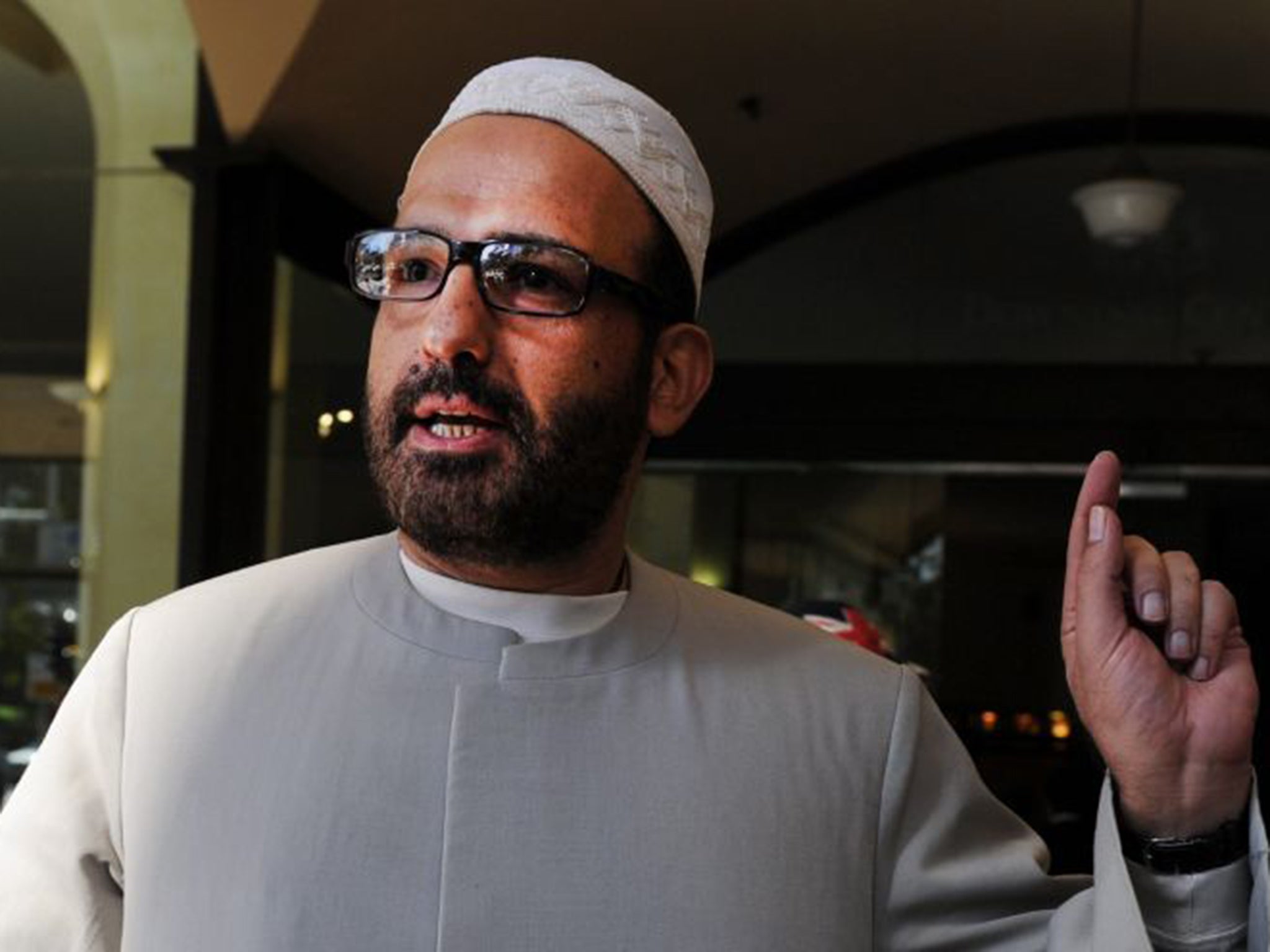 Muslim cleric Man Haron Monis arriving at the Downing Centre after a pre-trial hearing of his case in Sydney, on 18 April 2011