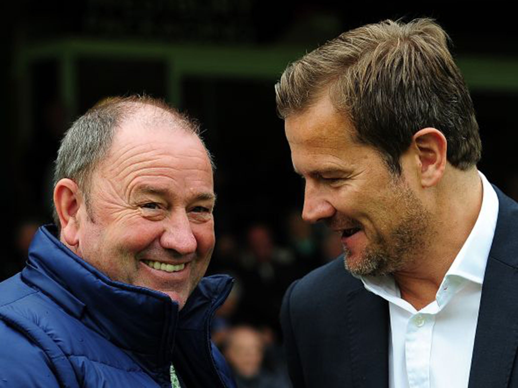 Yeovil manager, Gary Johnson, left (pictured with Mark Cooper, Manager of Swindon Town) reckons earnings from the United game could be around £250,000 (Getty)