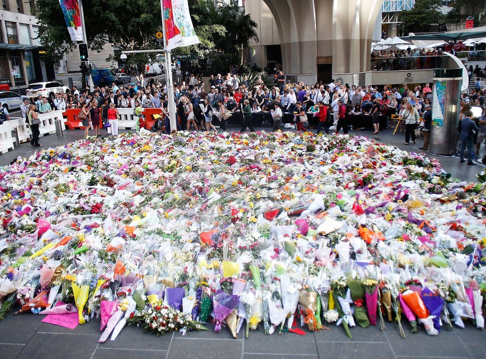 A Muslim bride interrupted her wedding day to lay her bouquet at the memorial site in Sydney 