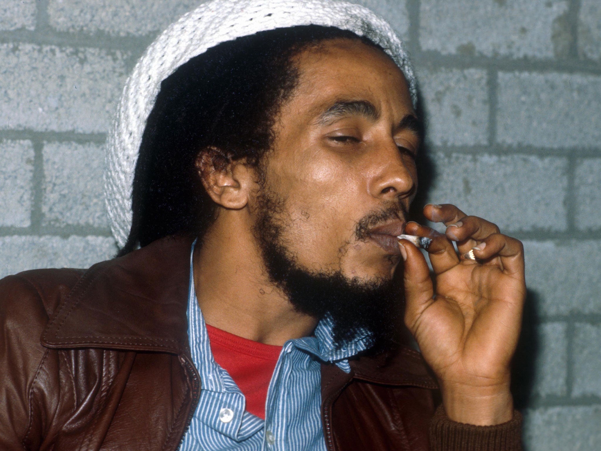 Bob Marley smoking a joint backstage before a gig in Rotterdam