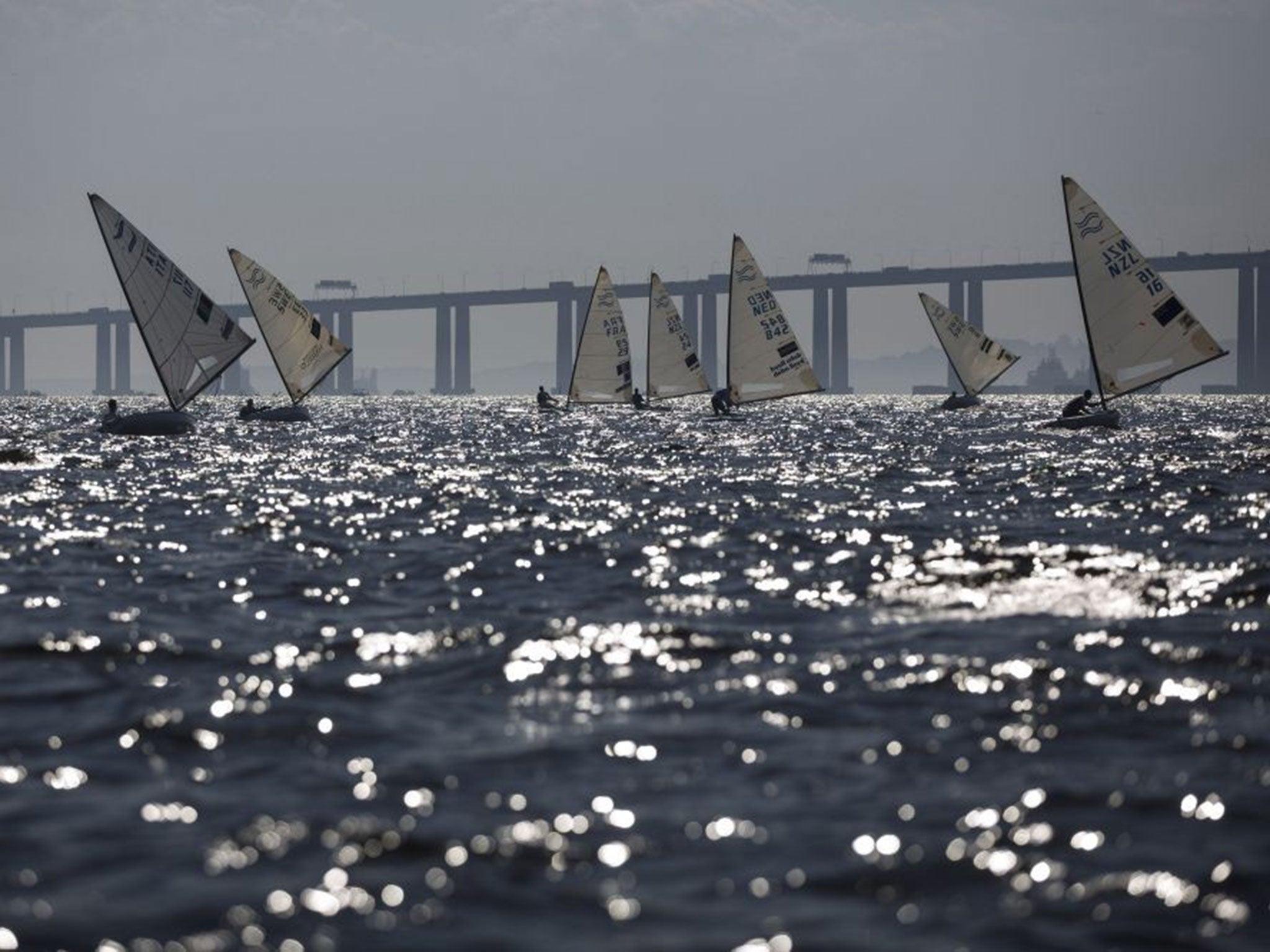 Athletes of the Finn class compete during the first test event for the Rio 2016 Olympic Games at the Guanabara Bay in Rio de Janeiro, Brazil, on 3 August, 2014