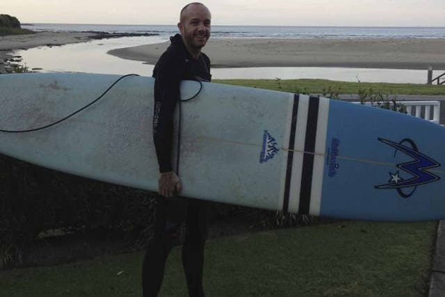 Surf's up: Matt Richell preparing to hit the waves - the pastime that would ultimately end his lifelong friendship with writer Saul Wordsworth