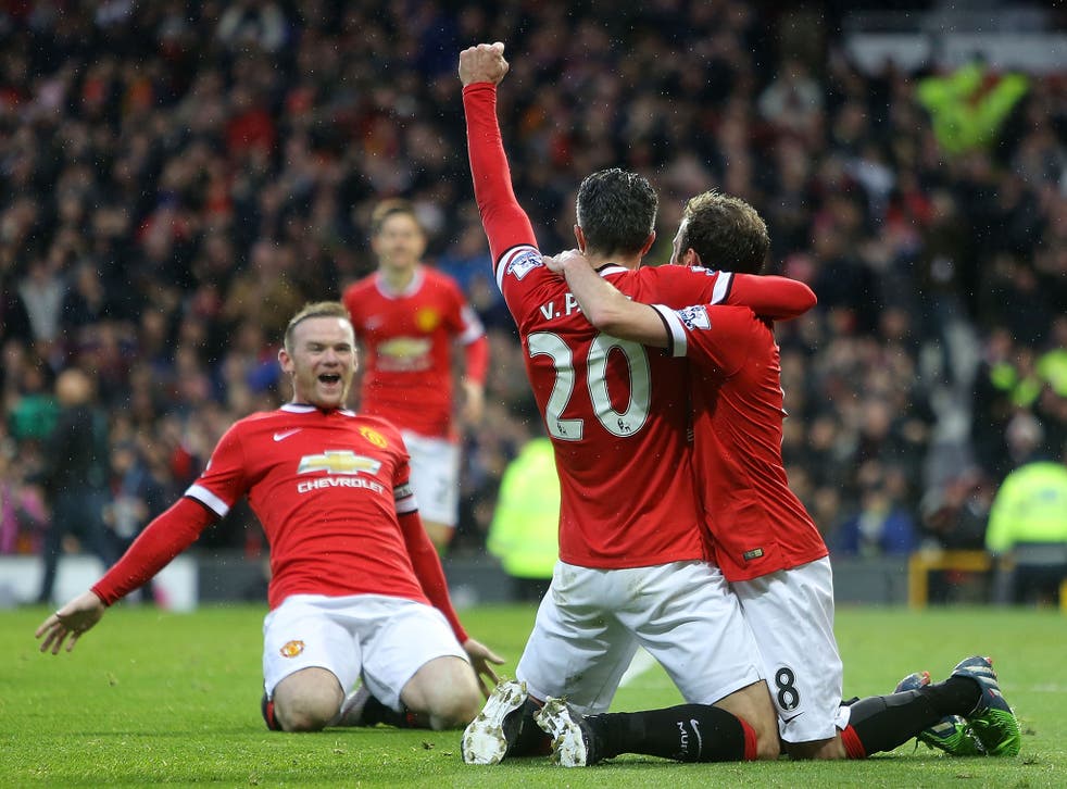 Wayne Rooney, Robin van Persie and Juan Mata celebrate during Manchester United's victory over Liverpool