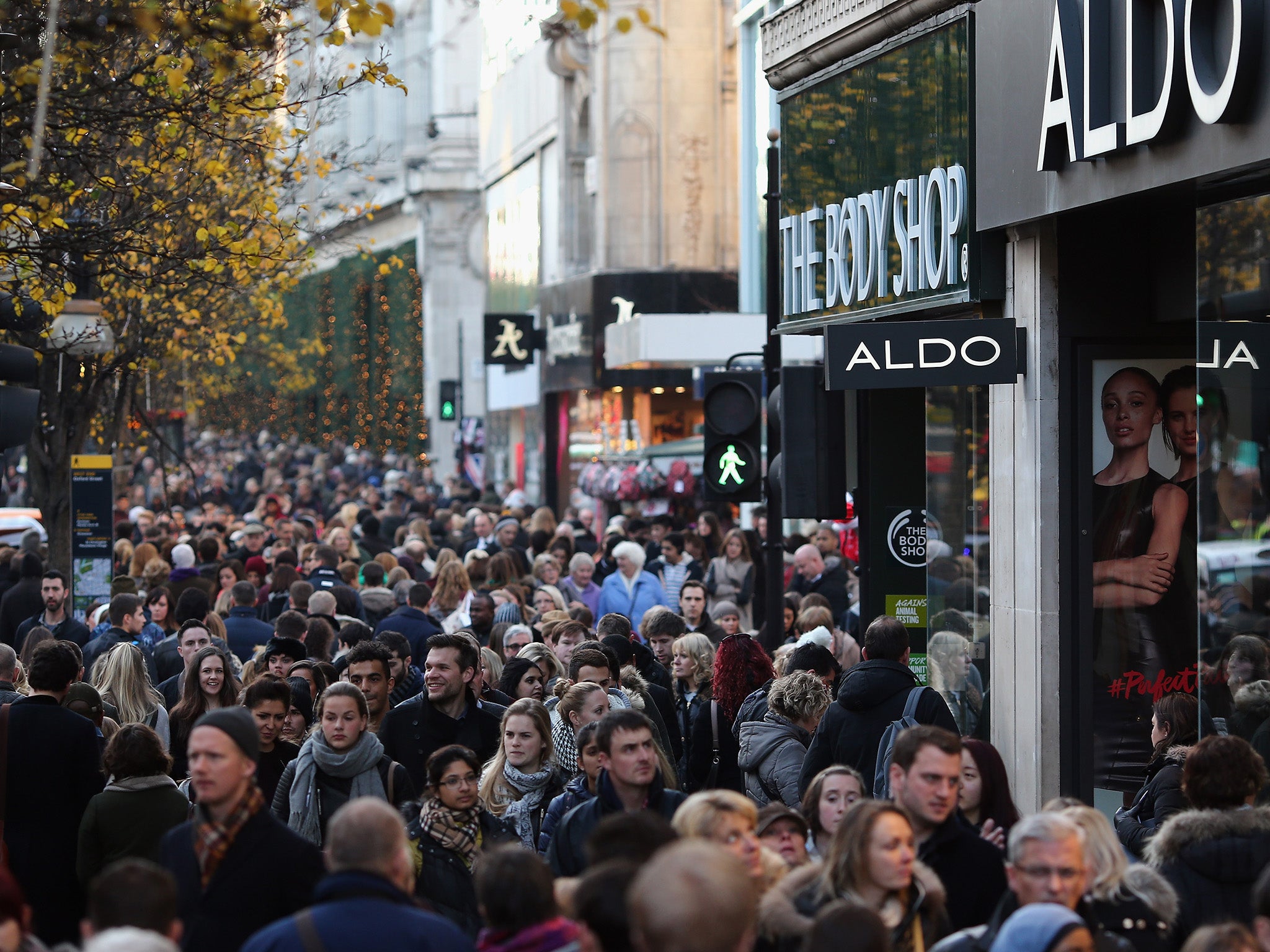 Christmas shoppers crowd Oxford Street on December 13, 2014 in London, England.