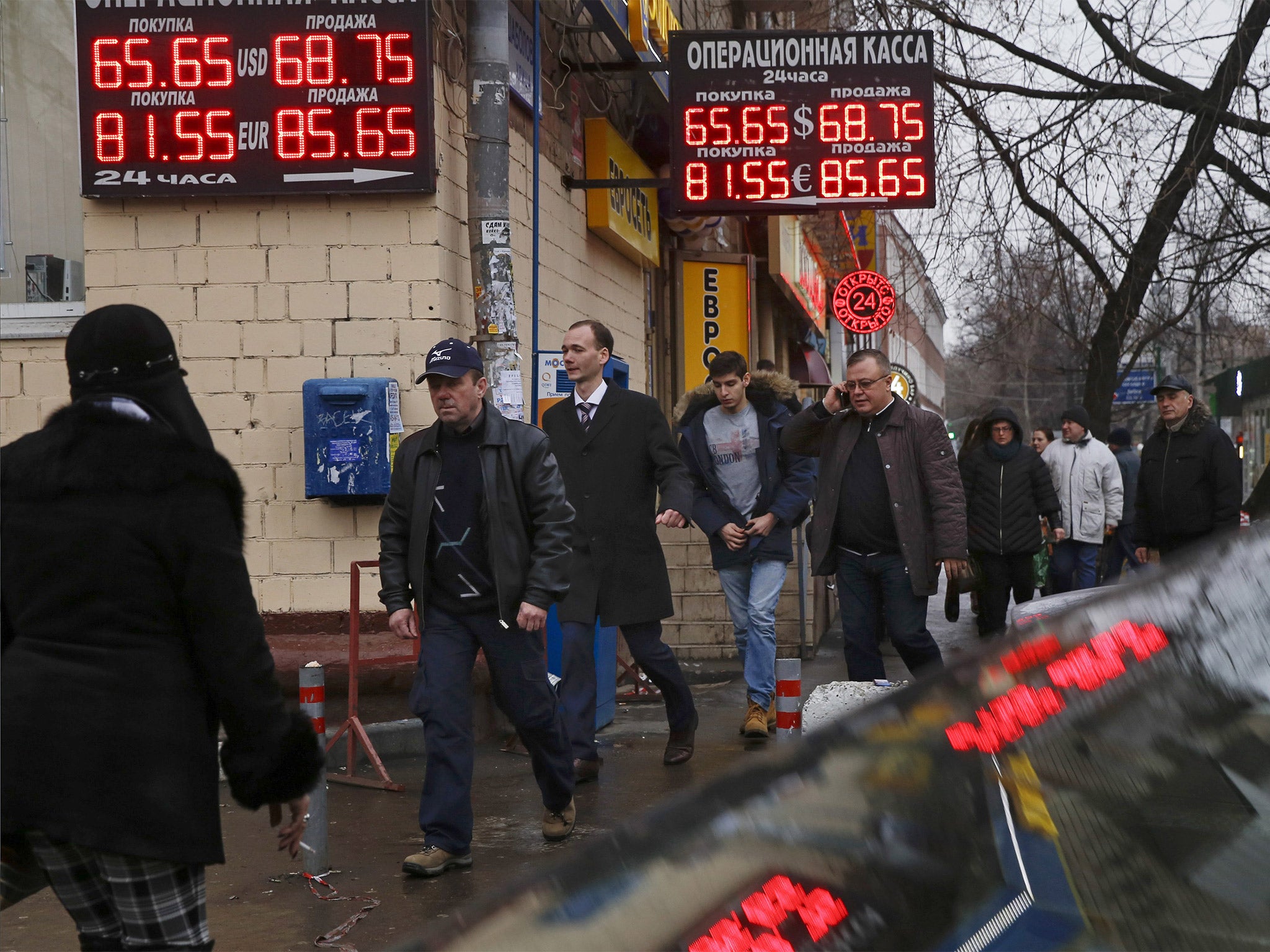 The rouble plunged to a record low against the dollar as the country’s stock market and derivatives exchange remained closed