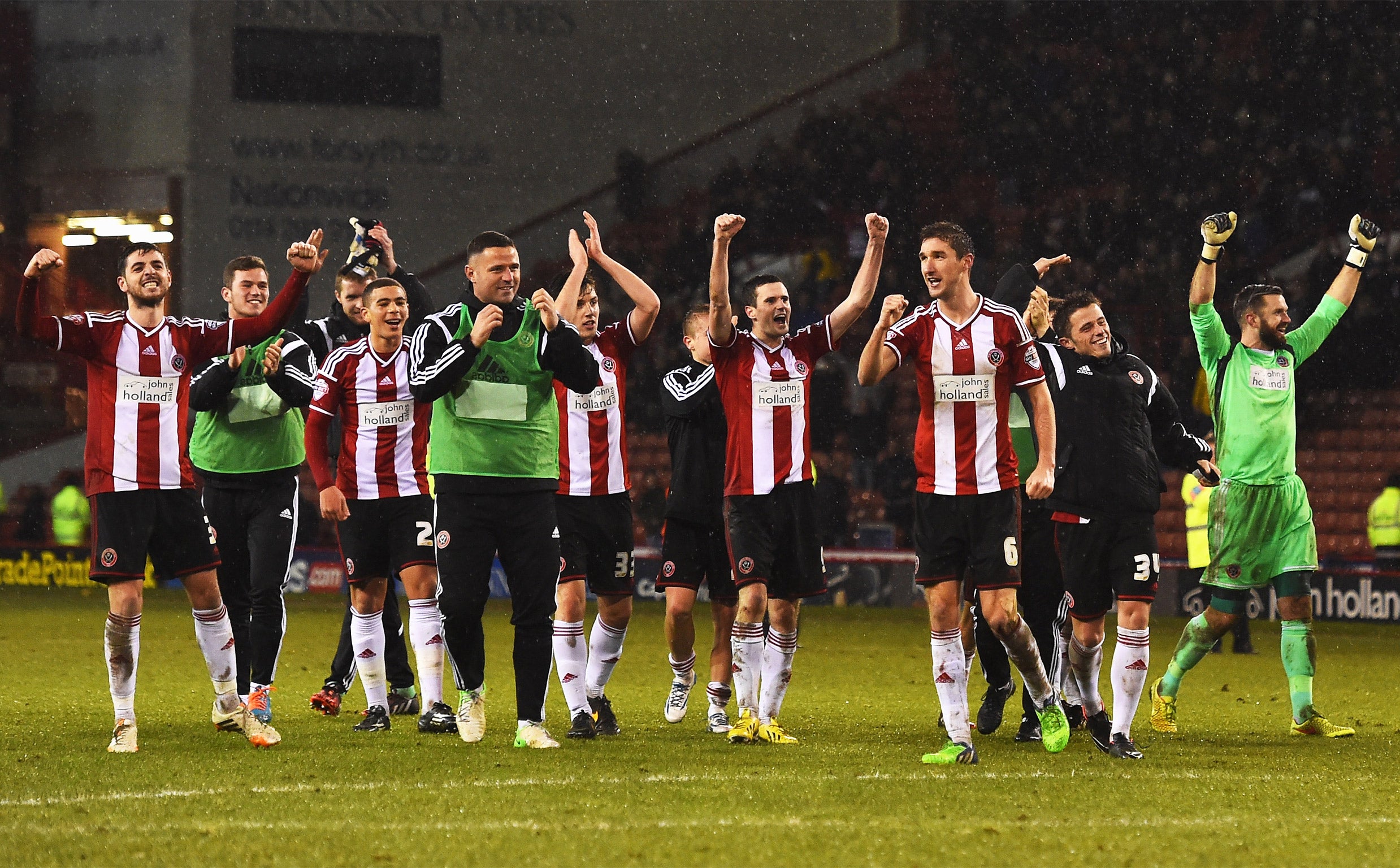 Sheffield United players celebrate reaching the semis (Getty)