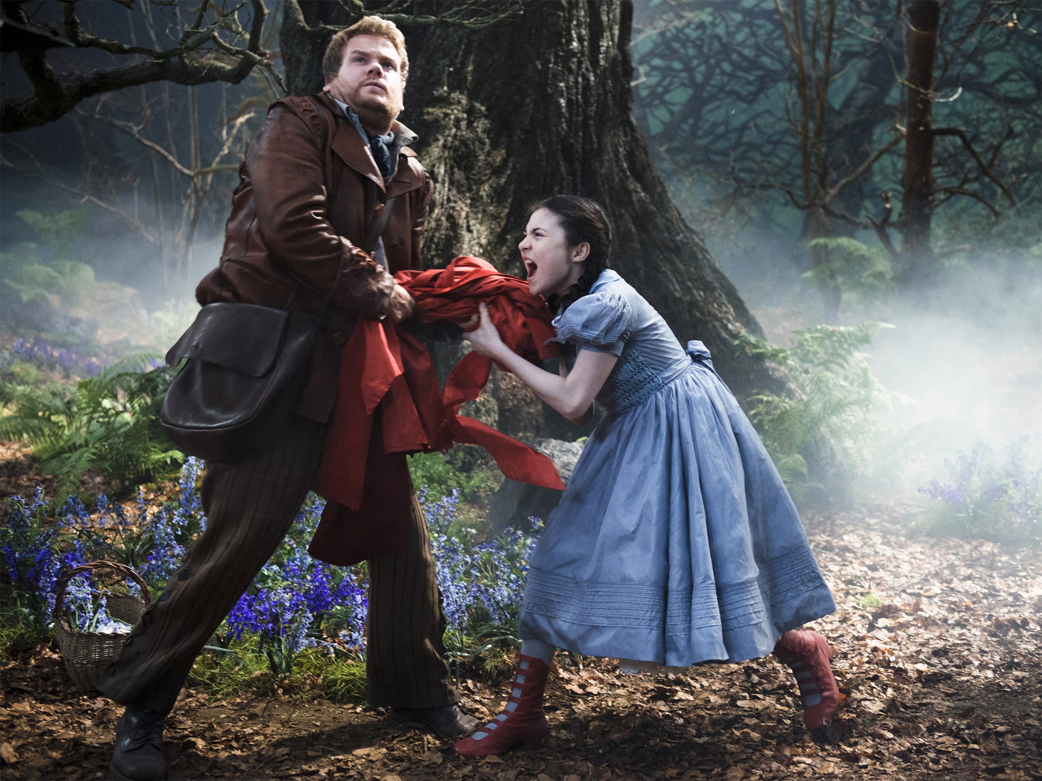 The Baker (James Corden) struggles with Lilla Crawford’s Little Red Riding Hood