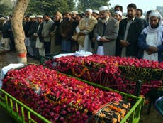 Pakistan mourns as Taliban massacre funerals are held