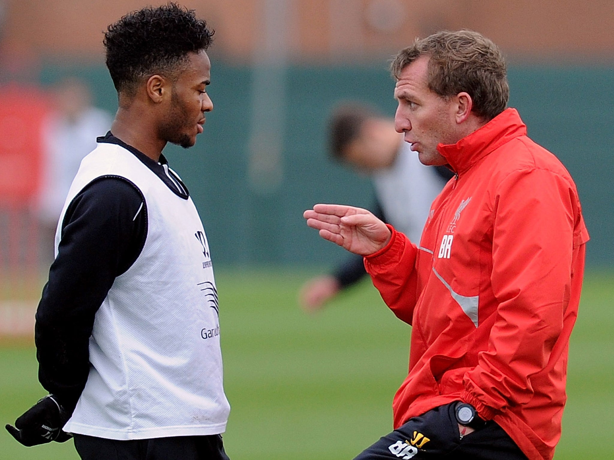Raheem Sterling with Brendan Rodgers during Liverpool training this week