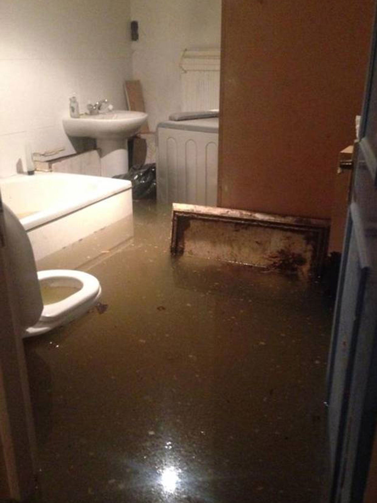A picture of Mr Ludmon's flooded bathroom