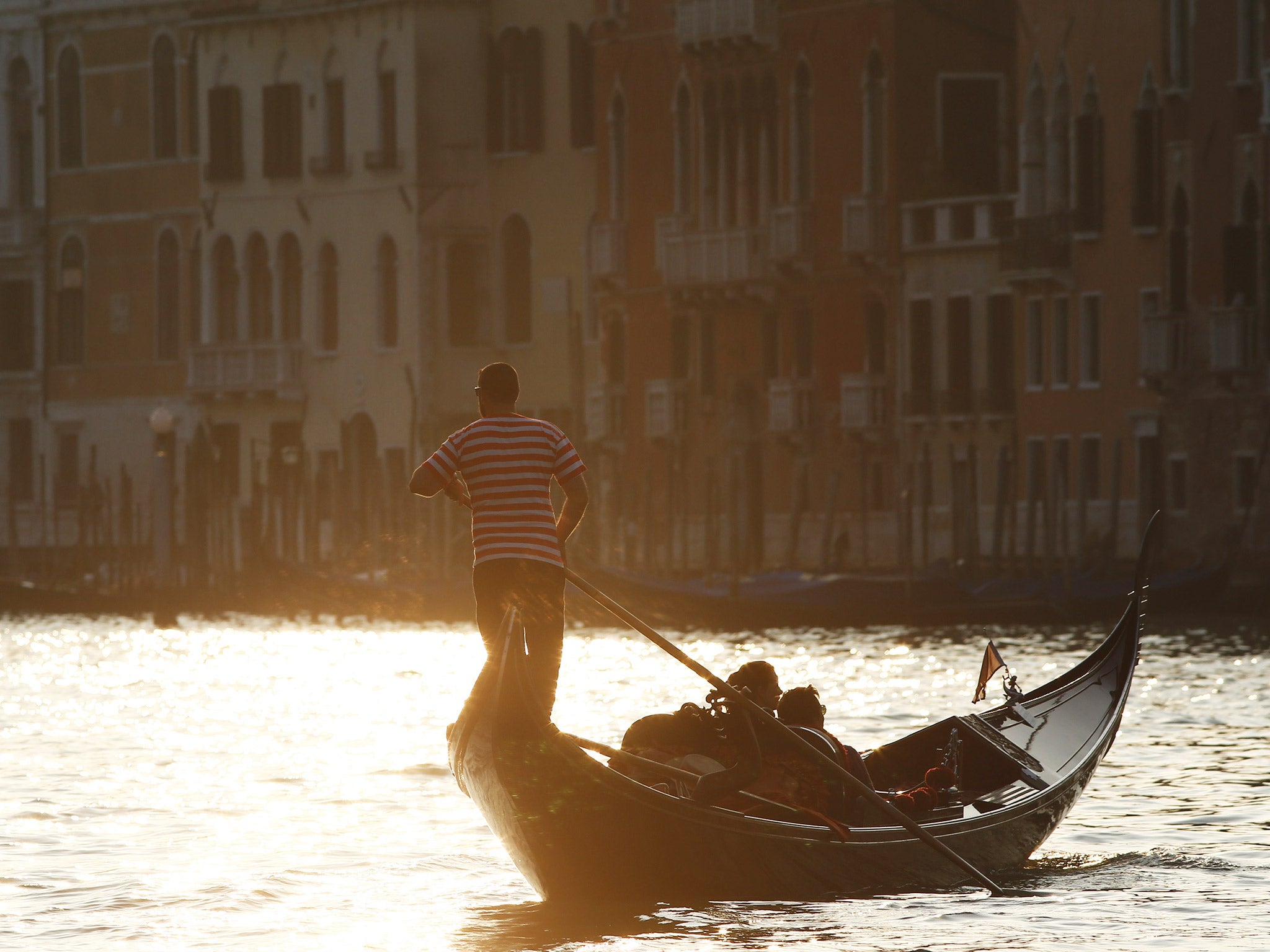 A gondola is pictured at sunset on the Grand Canal in Venice. File photo