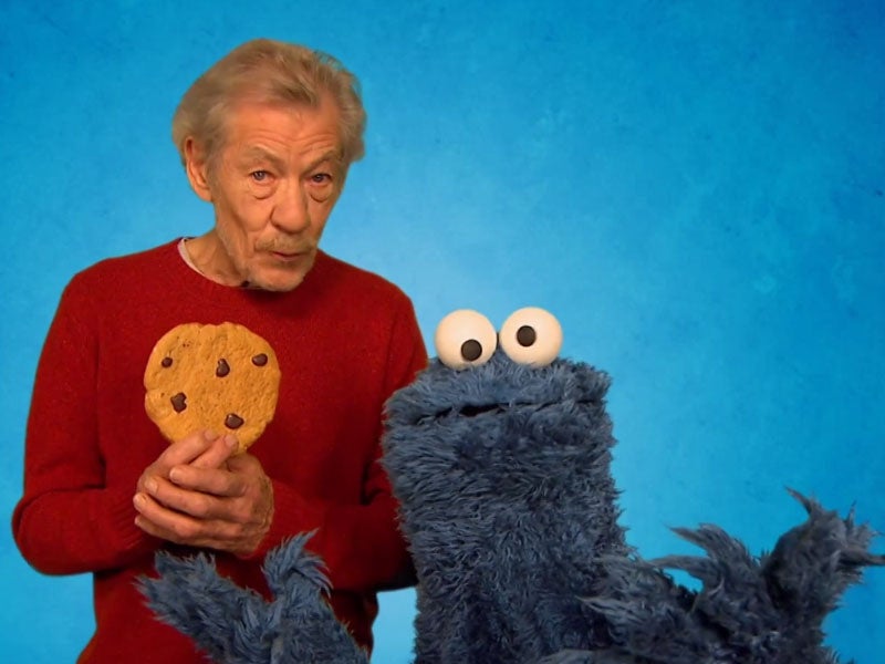 Sir Ian McKellen tempts the Cookie Monster