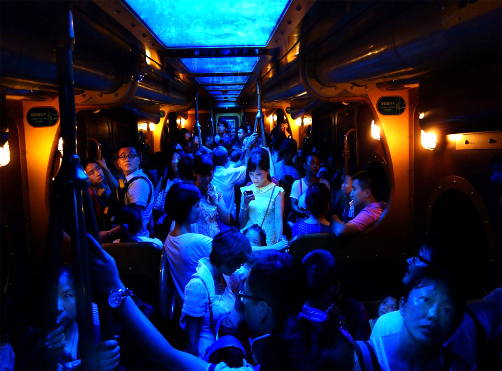 Brian Yen won the Grand-Prize with this photograph taken on a crowded train carriage in Hong Kong