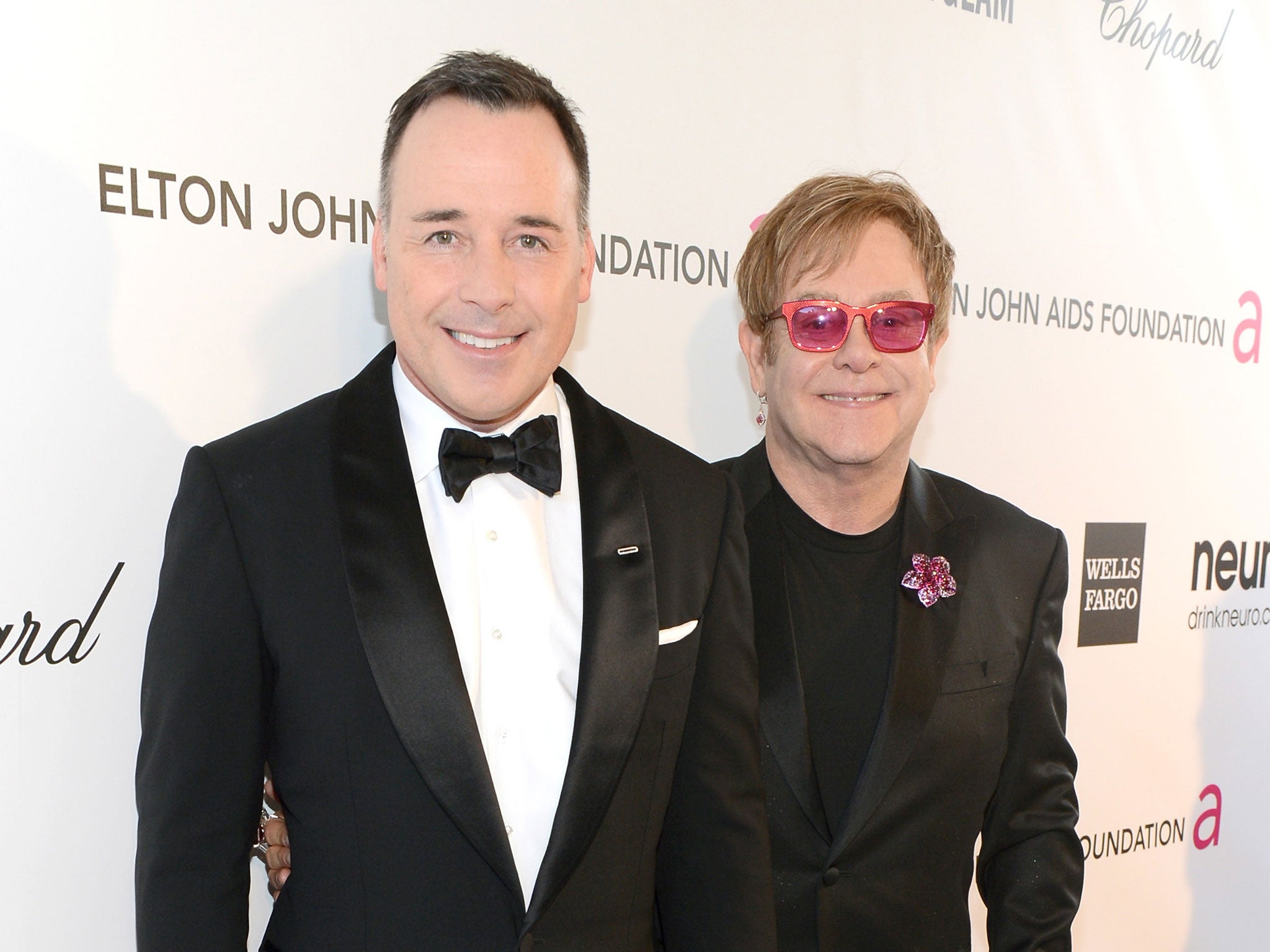 David Furnish and Elton John pictured in 2013