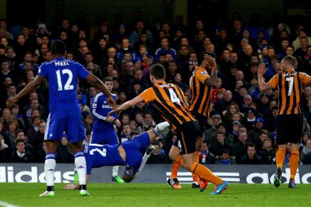 Cahill goes down during the match with Hull City