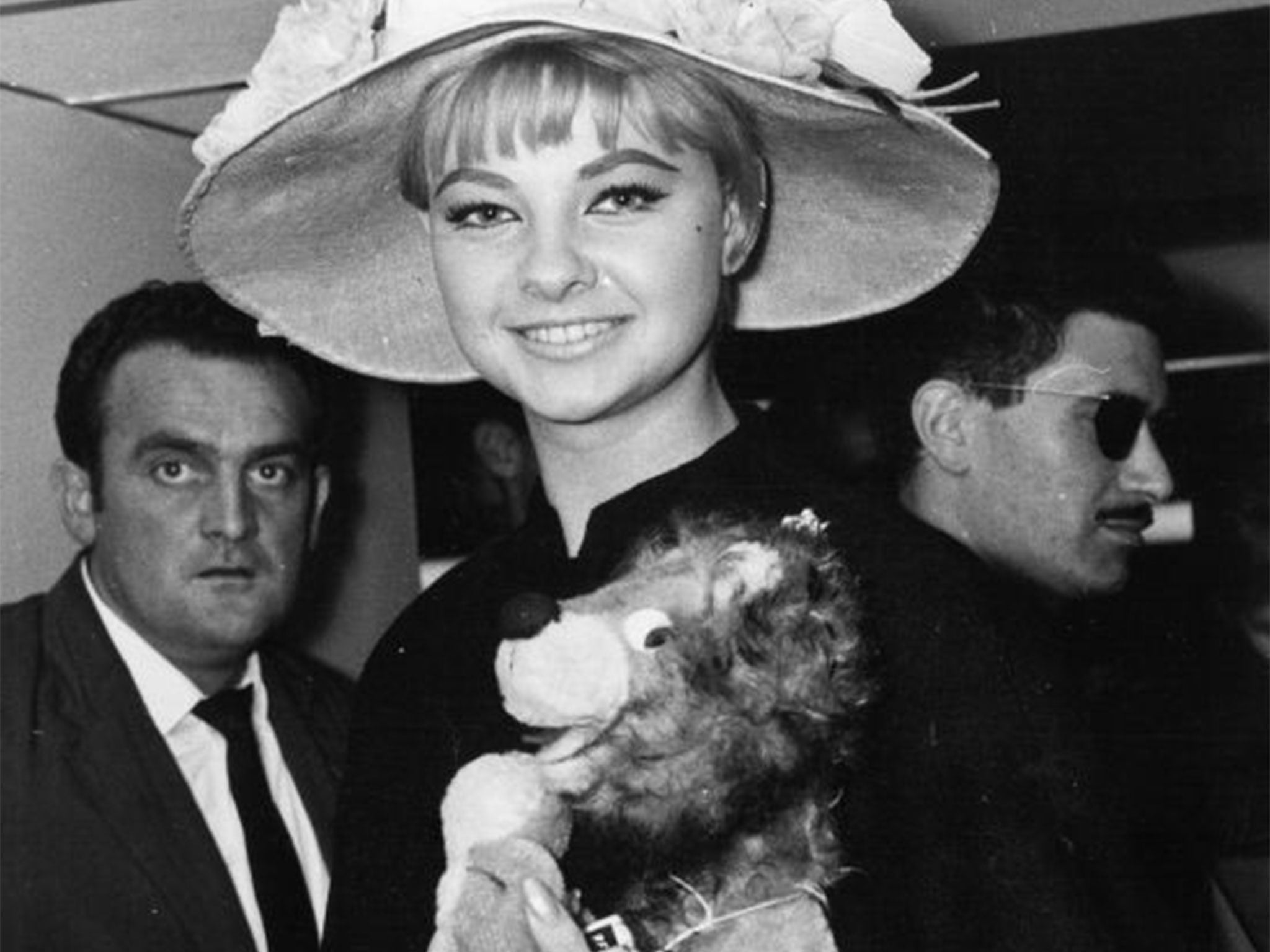 Mandy Rice-Davies at Heathrow airport in July 1963, weeks before the Ward trial began (PA)