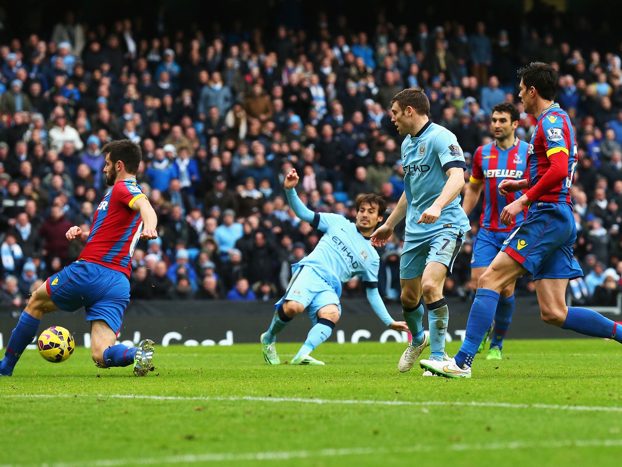 Dacid Silva strokes home his and City's second goal