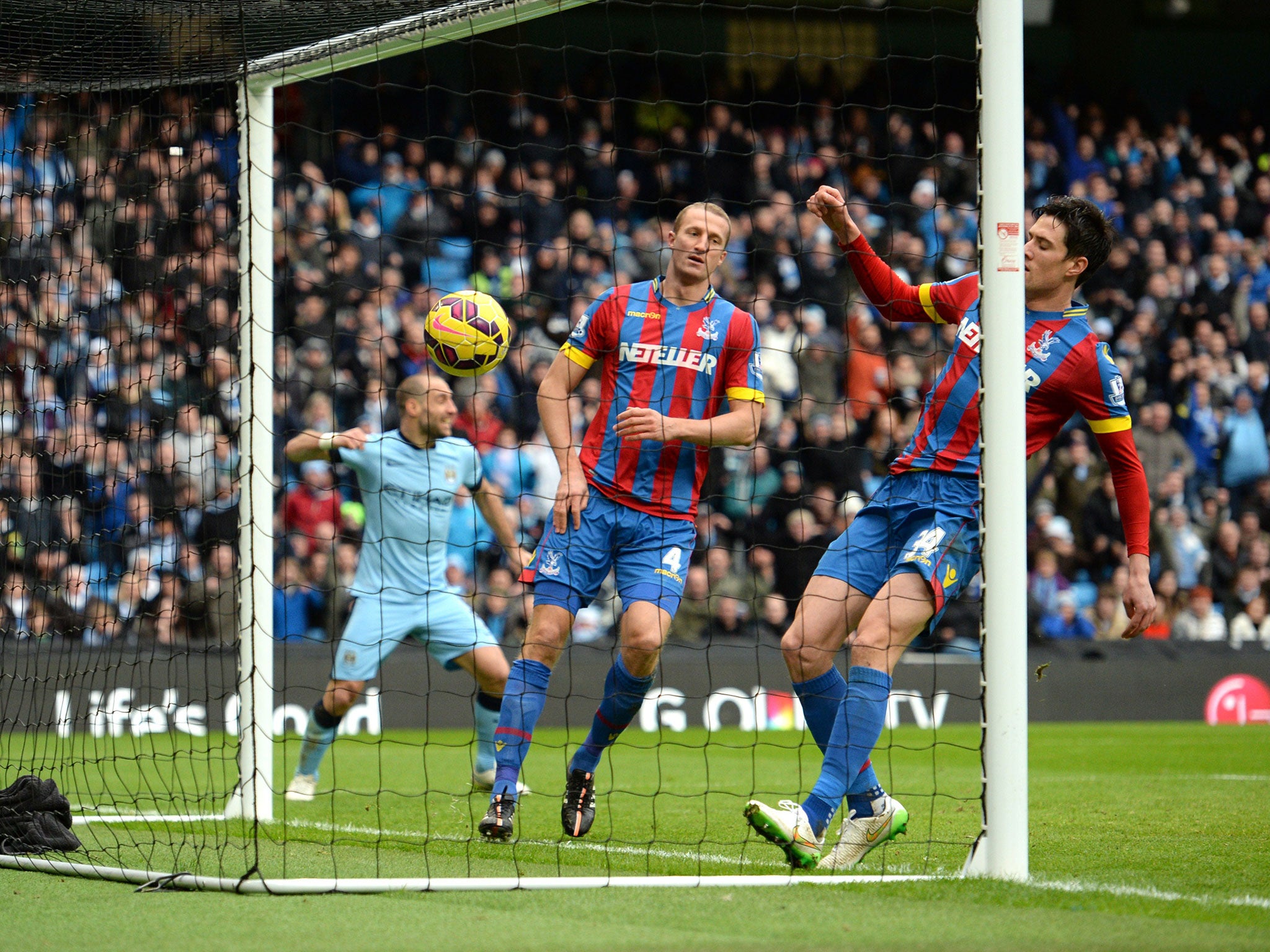 Brede Hangeland and Martin Kelly are unable to prevent Silva's deflected shot going in