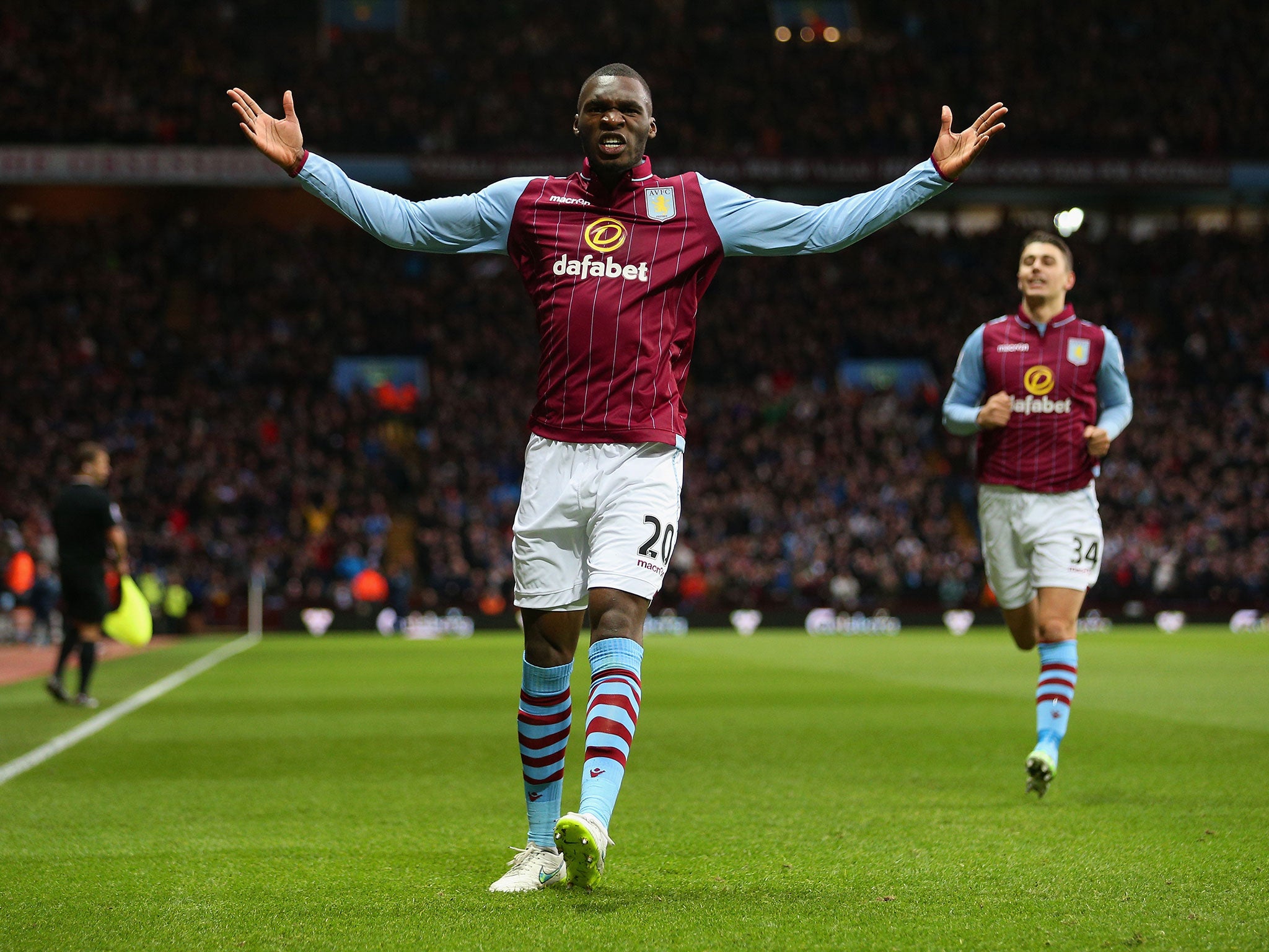 Benteke celebrates scoring the opening goal against Manchester United