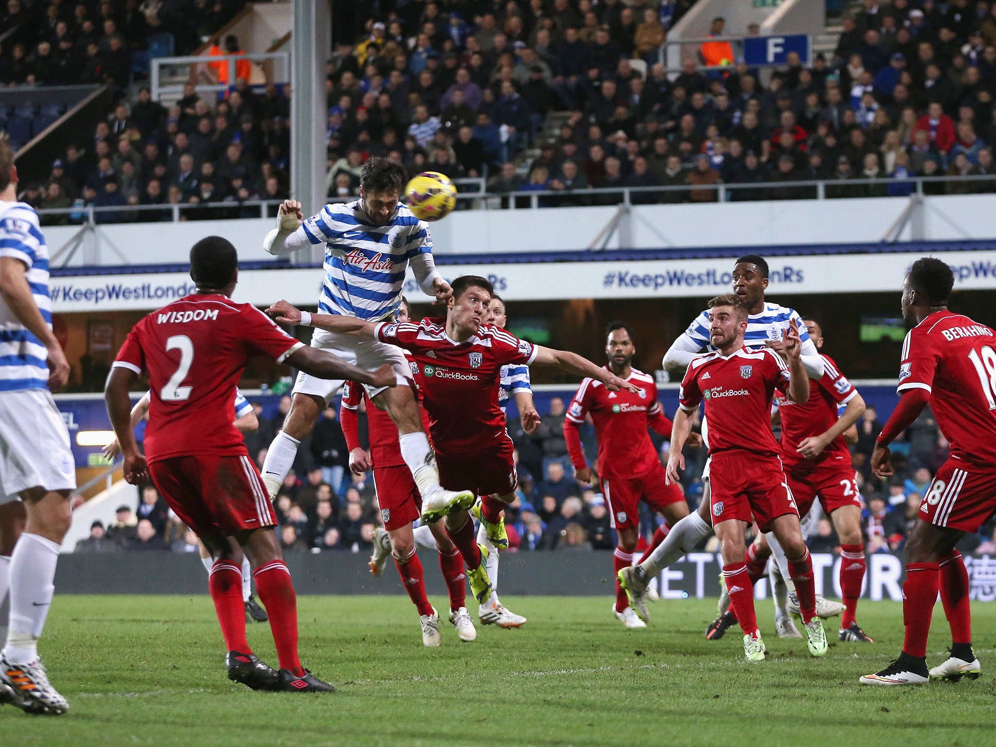 Charlie Austin heads in his third goal to win the game for QPR