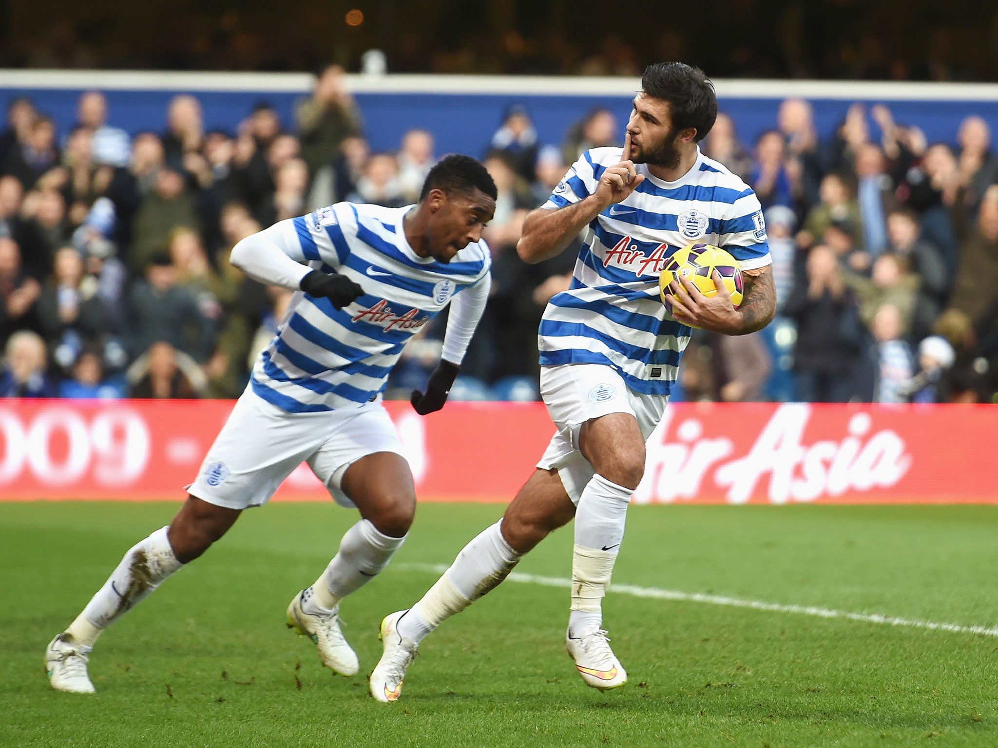 Charlie Austin rushes back after scoring his first goal of the game against West Brom
