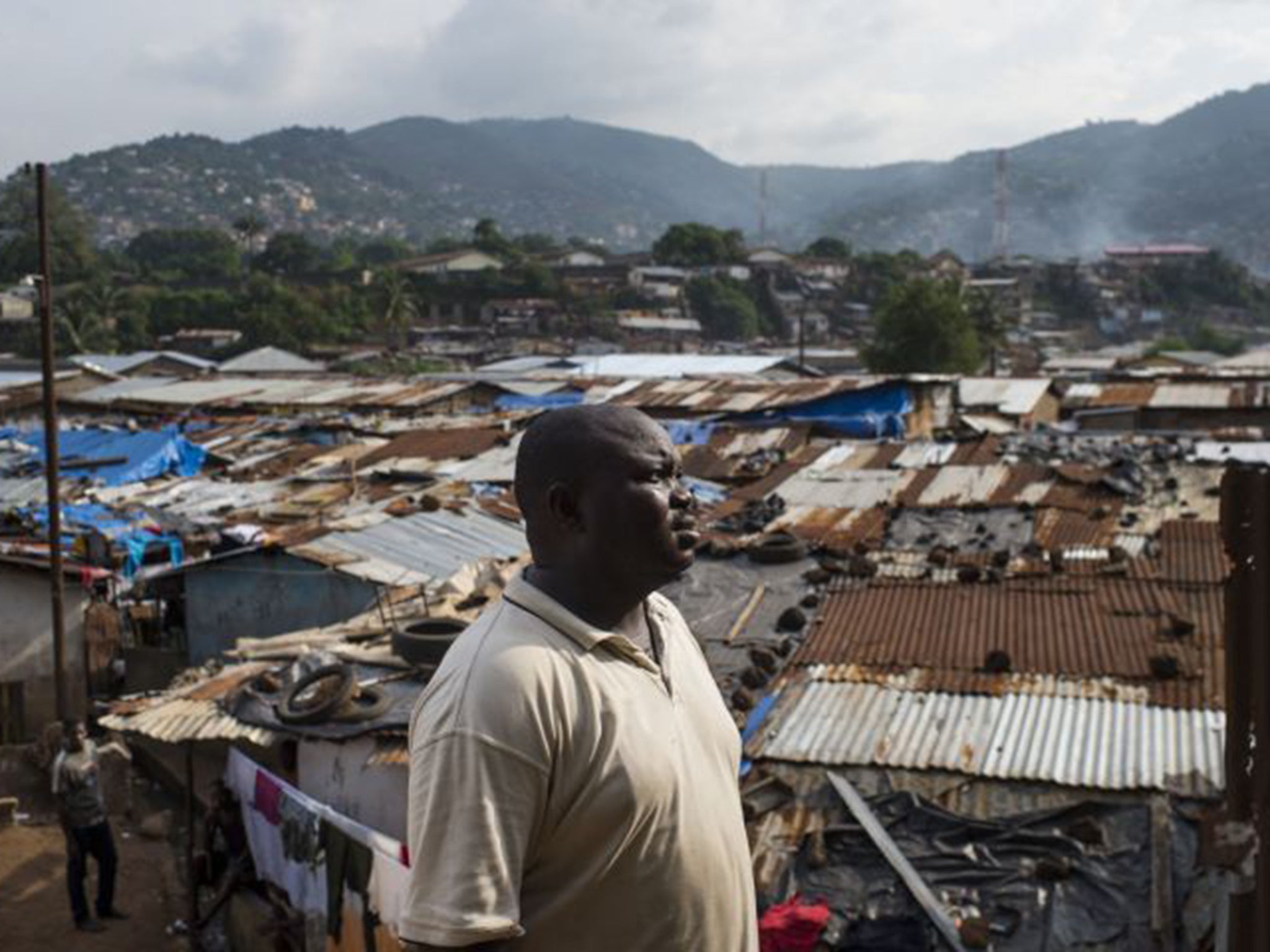 For three years Andrew Kondoh protected a pile of dead bodies from being trampled or picked at by dogs