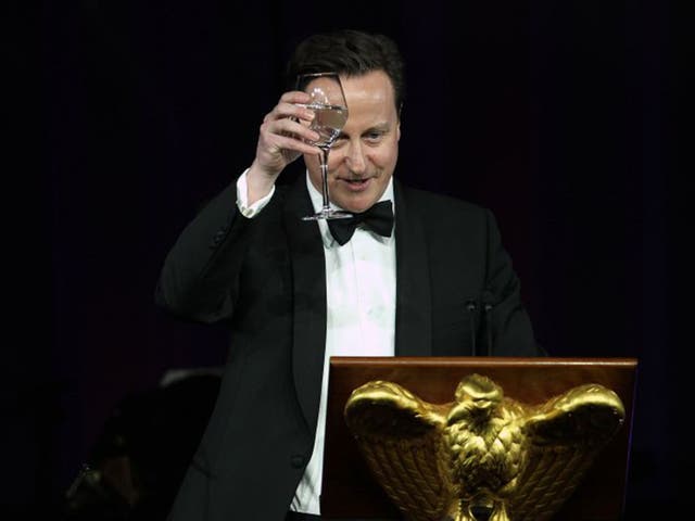 David Cameron gives a speech at a Tory party dinner