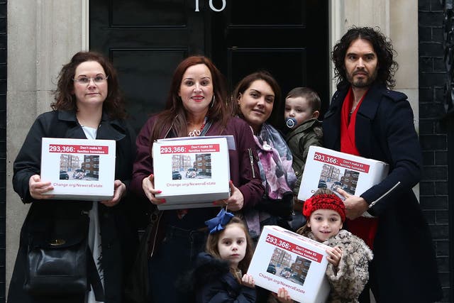 Russell Brand joins residents and supporters from the New Era housing estate in East London as they deliver a petition to 10 Downing Street