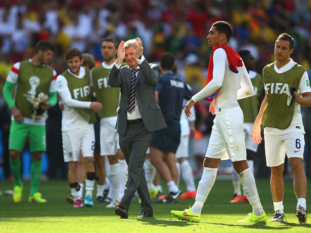 Roy Hodgson leads his England players over to the fans at the World Cup